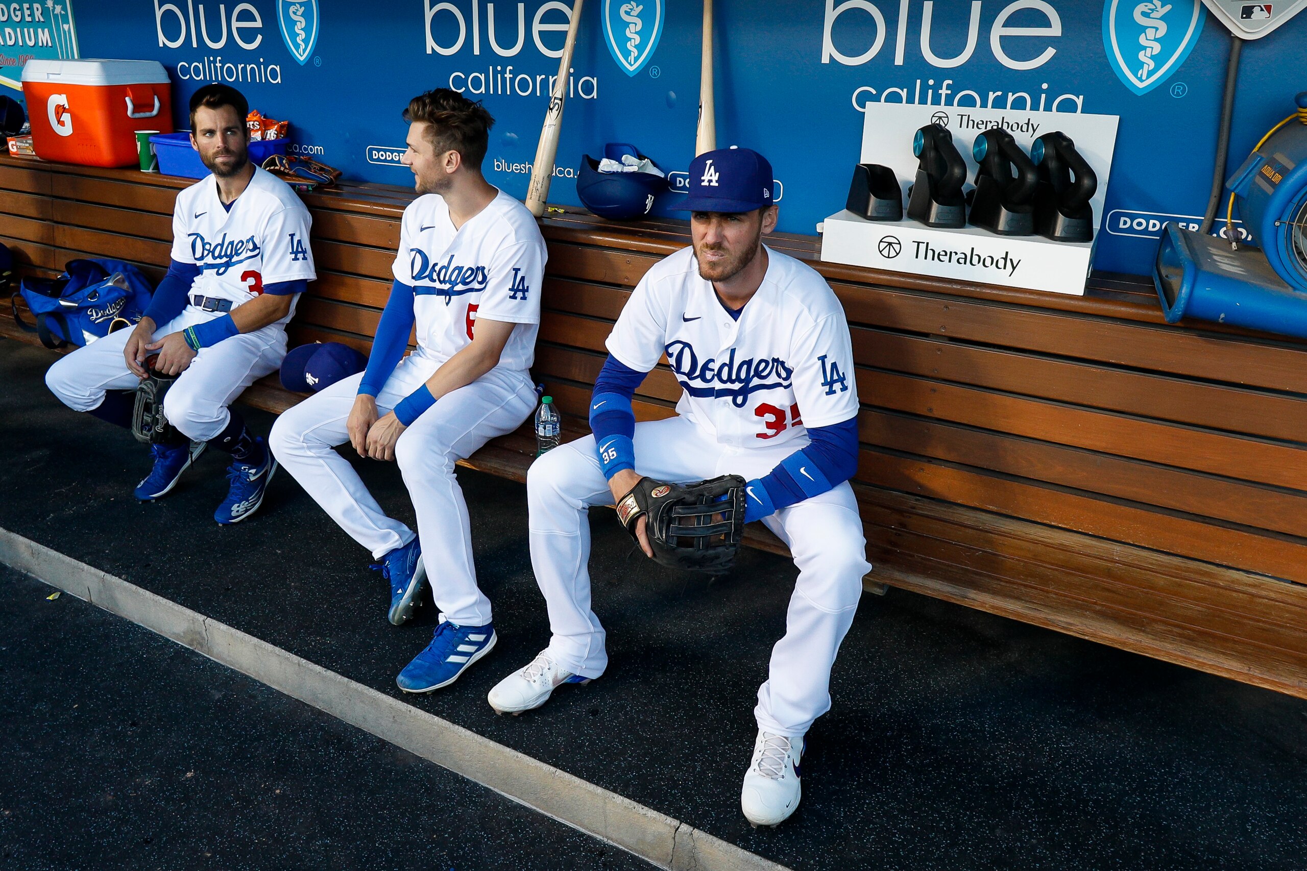 LOS ANGELES, CA - MAY 12: Los Angeles Dodgers left fielder Chris Taylor (3), shortstop Trea Turner (6), and center fielder Cody Bellinger (35) wait to take the field prior to a regular season game between the Los Angeles Dodgers and Philadelphia Phillies on May 12, 2022, at Dodger Stadium in Los Angeles, CA. (Photo by Brandon Sloter/Icon Sportswire via Getty Images)