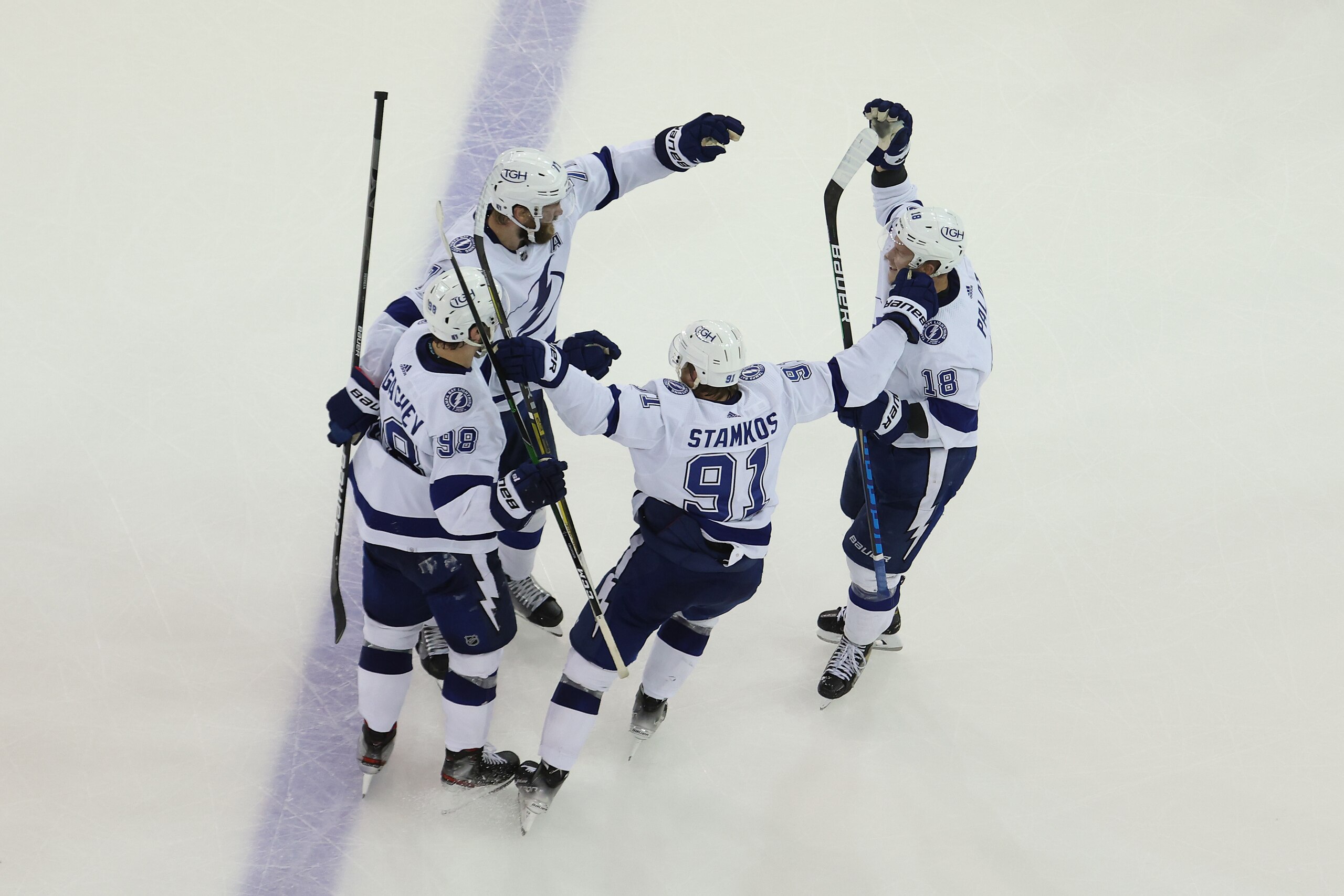 NEW YORK, NEW YORK - JUNE 09: Mikhail Sergachev #98 of the Tampa Bay Lightning celebrates with teammates after scoring the go-ahead goal during the third period against the New York Rangers in Game Five of the Eastern Conference Final of the 2022 Stanley Cup Playoffs at Madison Square Garden on June 09, 2022 in New York City. The goal was later credited to Ondrej Palat #18 of the Tampa Bay Lightning. (Photo by Al Bello/Getty Images)