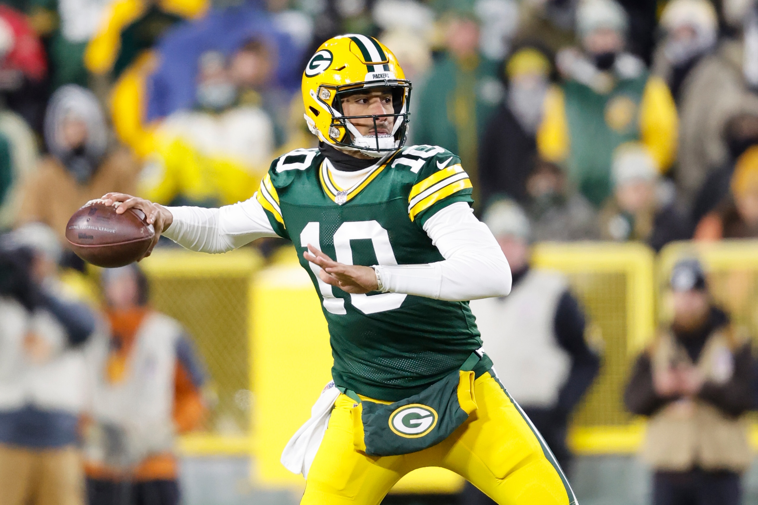 Green Bay Packers quarterback Jordan Love (10) passes against the Minnesota Vikings during an NFL game Sunday, Jan 2. 2022, in Green Bay, Wis. (AP Photo/Jeffrey Phelps)