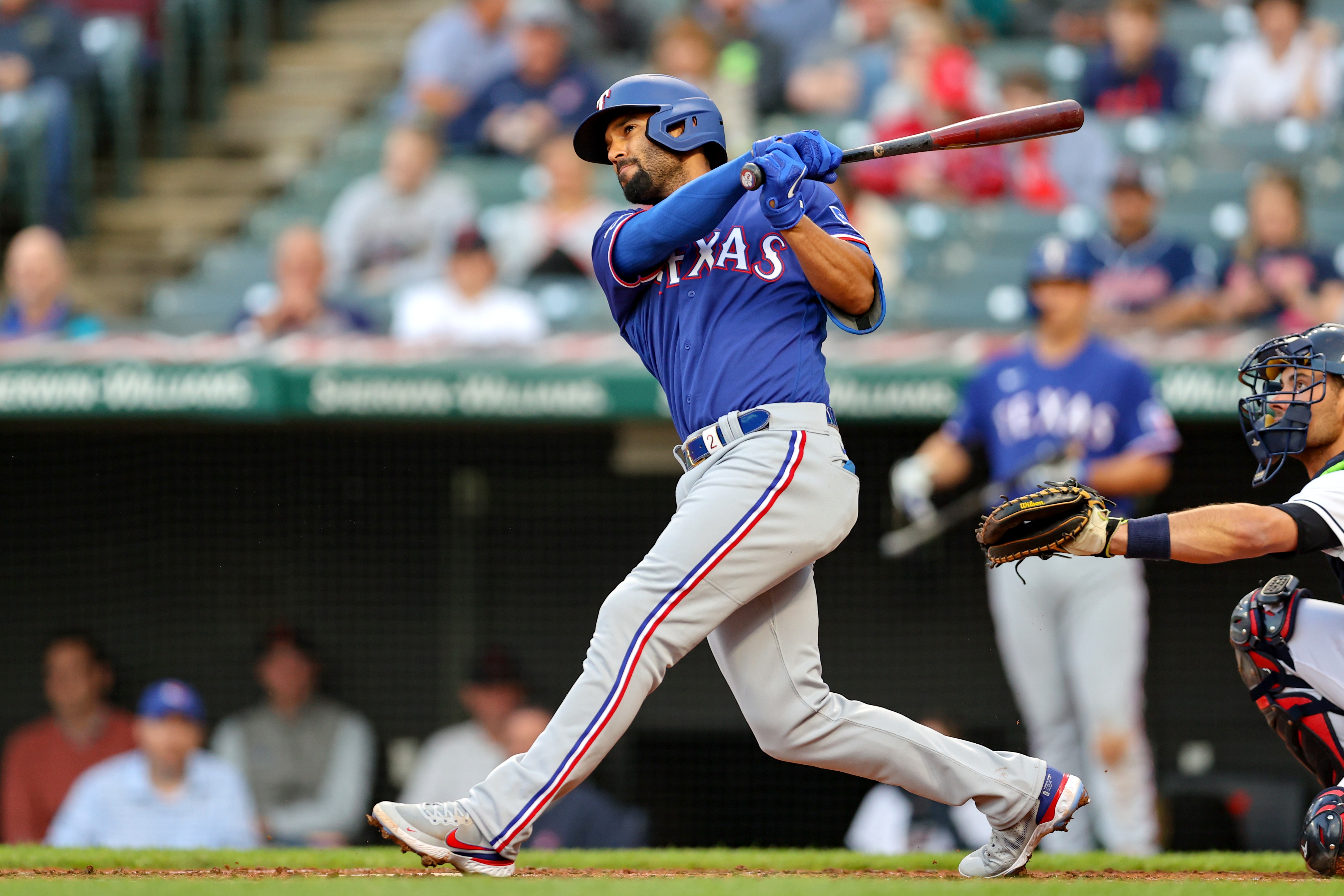 CLEVELAND, OH - JUNE 07: Texas Rangers second baseman Marcus Semien (2) hits a home run during the third inning of game 2 of the the Major League Baseball doubleheader between the Texas Rangers and Cleveland Guardinas on June 7, 2022, at Progressive Field in Cleveland, OH. (Photo by Frank Jansky/Icon Sportswire via Getty Images)