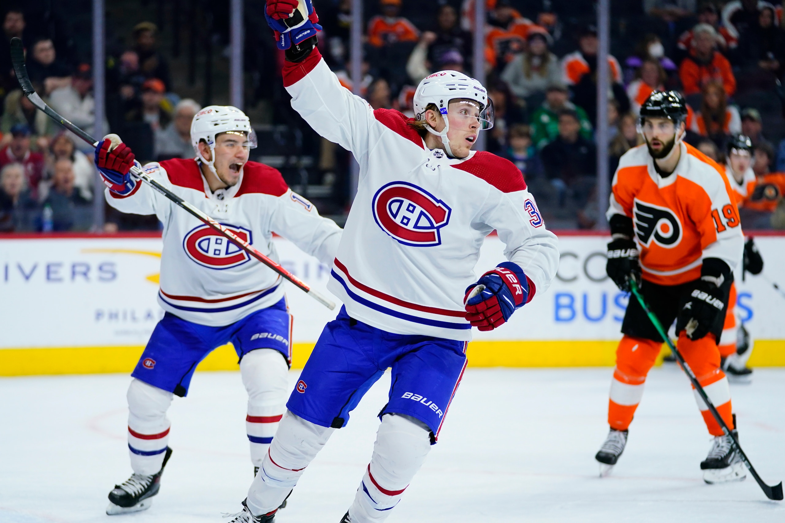 Montreal Canadiens' Rem Pitlick, center, celebrates after scoring a goal during the third period of an NHL hockey game against the Philadelphia Flyers, Sunday, March 13, 2022, in Philadelphia. (AP Photo/Matt Slocum) Montreal Canadiens' Rem Pitlick, center, celebrates after scoring a goal during the third period of an NHL hockey game against the Philadelphia Flyers, Sunday, March 13, 2022, in Philadelphia. (AP Photo/Matt Slocum)