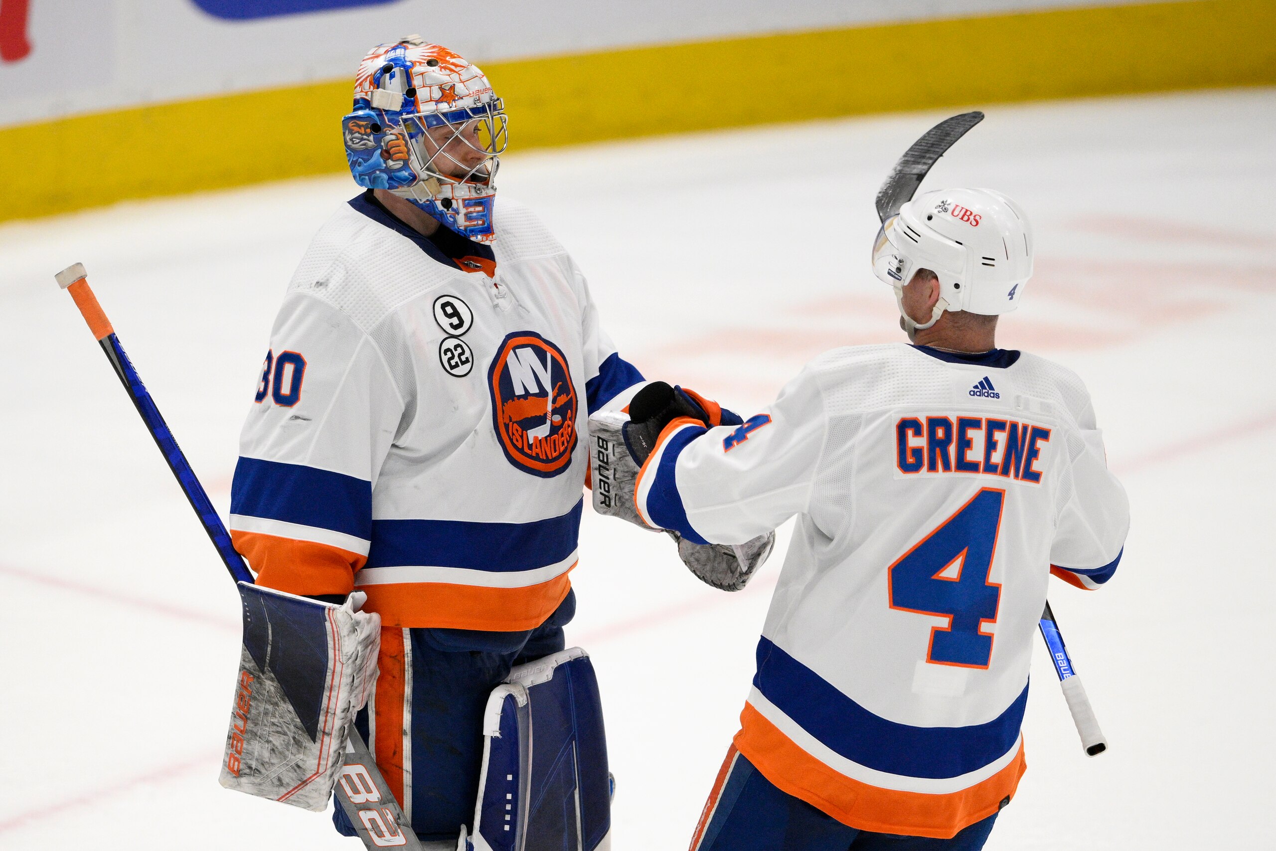 New York Islanders goaltender Ilya Sorokin (30) and defenseman Andy Greene (4) celebrate after an NHL hockey game against the Washington Capitals, Tuesday, April 26, 2022, in Washington. The Islanders 4-1. (AP Photo/Nick Wass) New York Islanders goaltender Ilya Sorokin (30) and defenseman Andy Greene (4) celebrate after an NHL hockey game against the Washington Capitals, Tuesday, April 26, 2022, in Washington. The Islanders 4-1. (AP Photo/Nick Wass)
