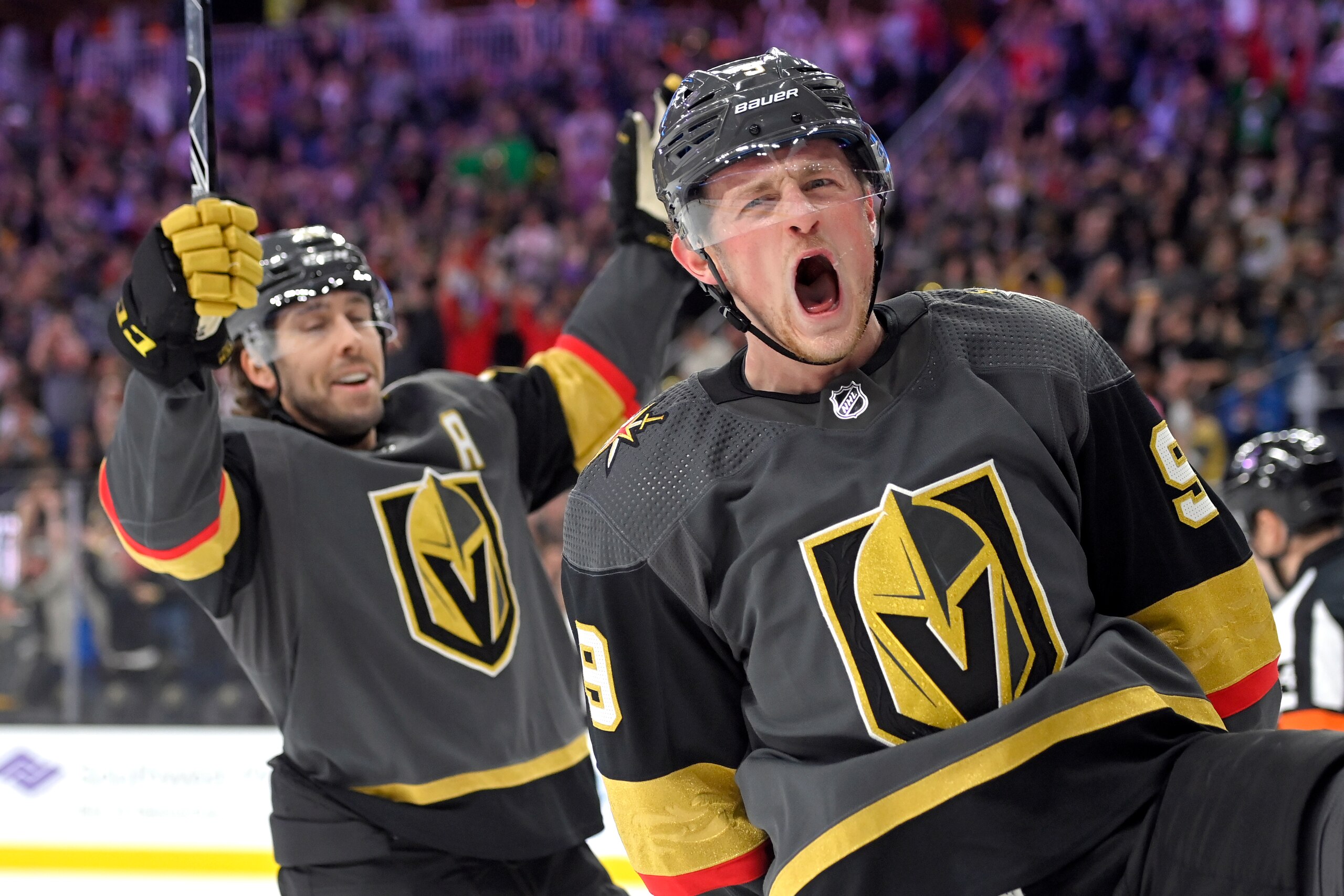 Vegas Golden Knights center Jack Eichel (9) and center Chandler Stephenson (20) celebrate Eichel's power-play goal against the Nashville Predators during the second period of an NHL hockey game Thursday, March 24, 2022, in Las Vegas. (AP Photo/David Becker) Vegas Golden Knights center Jack Eichel (9) and center Chandler Stephenson (20) celebrate Eichel's power-play goal against the Nashville Predators during the second period of an NHL hockey game Thursday, March 24, 2022, in Las Vegas. (AP Photo/David Becker)