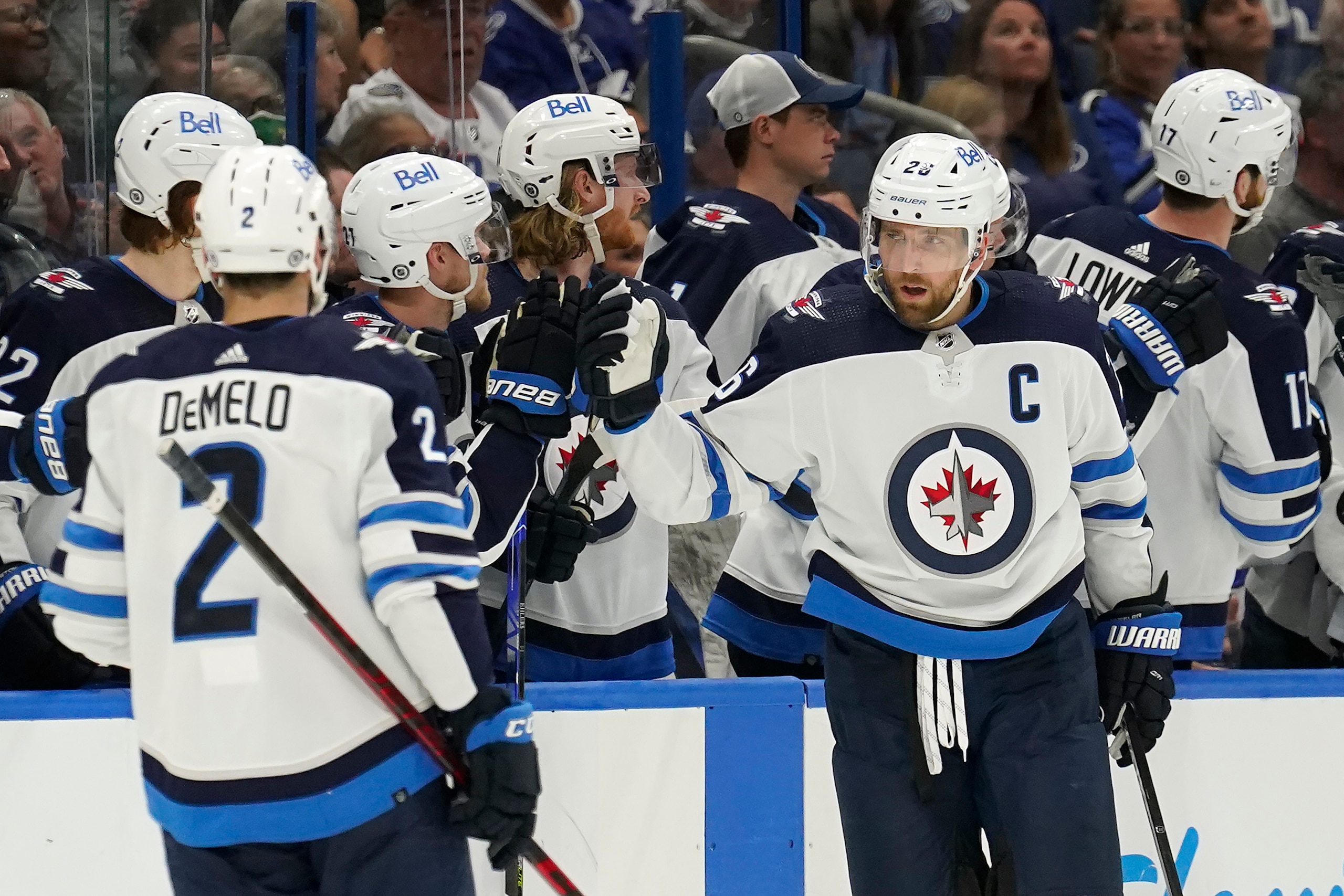 Winnipeg Jets right wing Blake Wheeler (26) celebrates with the bench after his goal against the Tampa Bay Lightning during the second period of an NHL hockey game Saturday, April 16, 2022, in Tampa, Fla. (AP Photo/Chris O'Meara) Winnipeg Jets right wing Blake Wheeler (26) celebrates with the bench after his goal against the Tampa Bay Lightning during the second period of an NHL hockey game Saturday, April 16, 2022, in Tampa, Fla. (AP Photo/Chris O'Meara)