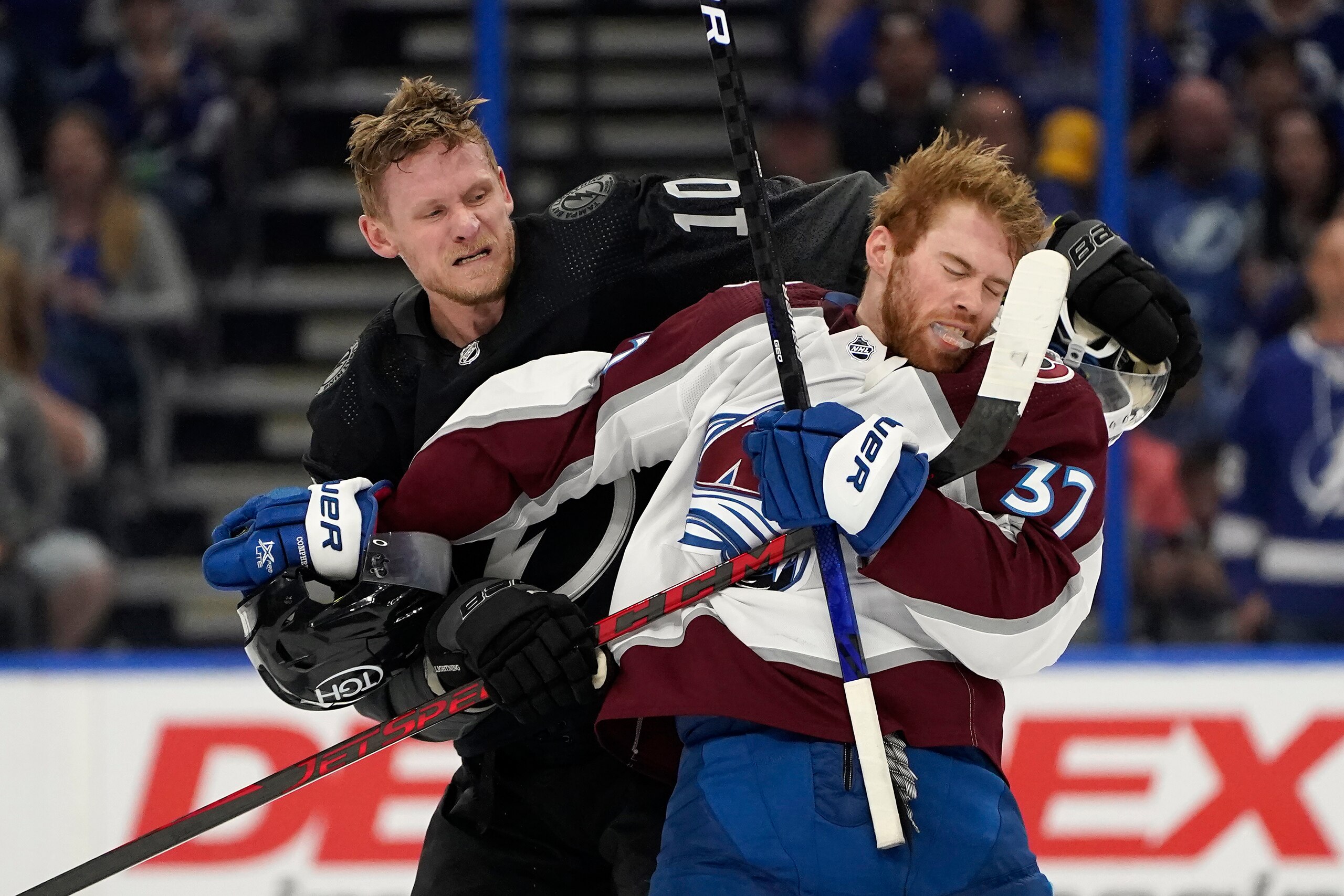 Tampa Bay Lightning right wing Corey Perry (10) and Colorado Avalanche left wing J.T. Compher (37) scrap during the second period of an NHL hockey game Saturday, Oct. 23, 2021, in Tampa, Fla. (AP Photo/Chris O'Meara) Tampa Bay Lightning right wing Corey Perry (10) and Colorado Avalanche left wing J.T. Compher (37) scrap during the second period of an NHL hockey game Saturday, Oct. 23, 2021, in Tampa, Fla. (AP Photo/Chris O'Meara)