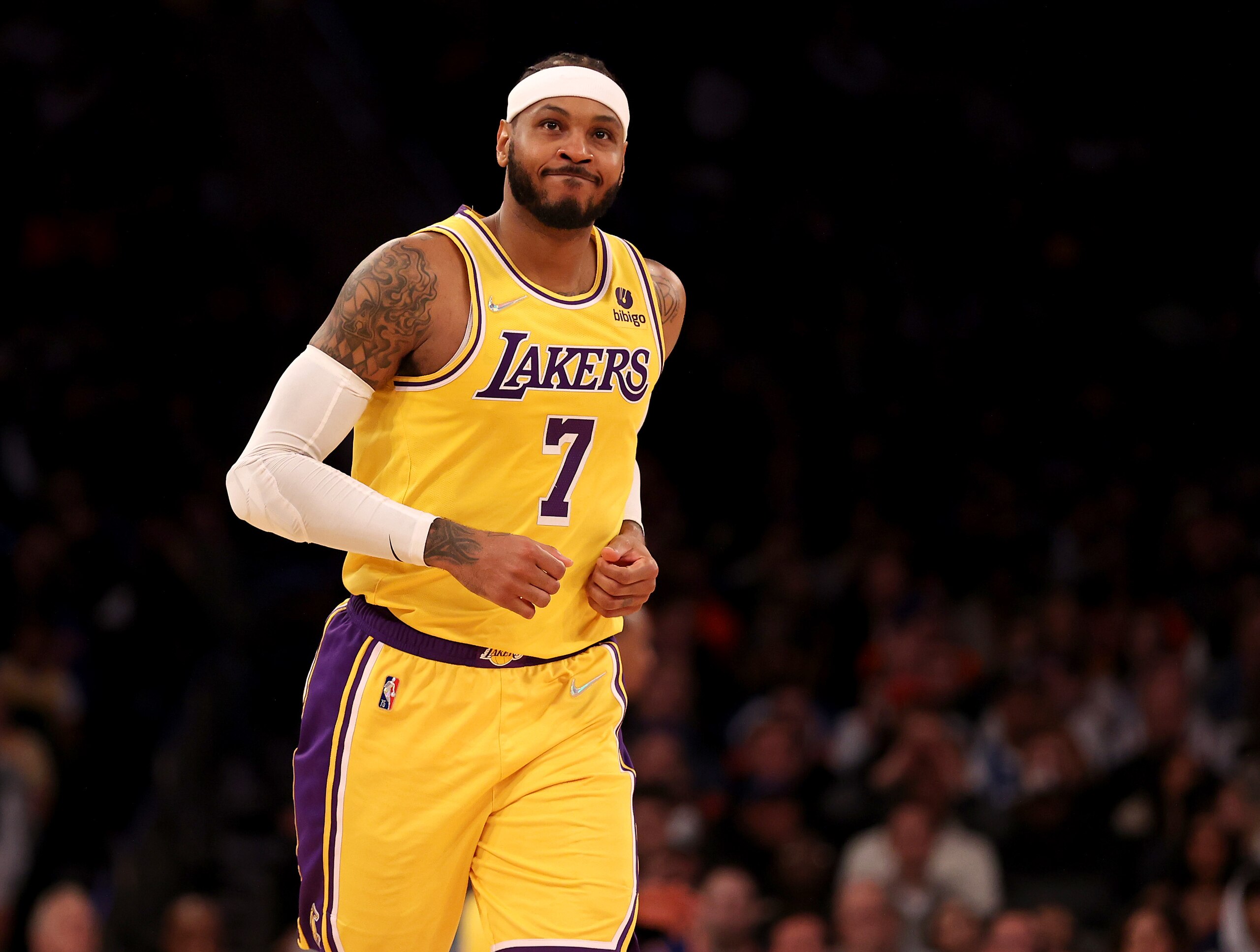 NEW YORK, NEW YORK - NOVEMBER 23:  Carmelo Anthony #7 of the Los Angeles Lakers reacts in the second half against the New York Knicks at Madison Square Garden on November 23, 2021 in New York City. The New York Knicks defeated the Los Angeles Lakers 106-100. NOTE TO USER: User expressly acknowledges and agrees that, by downloading and or using this photograph, User is consenting to the terms and conditions of the Getty Images License Agreement. (Photo by Elsa/Getty Images)