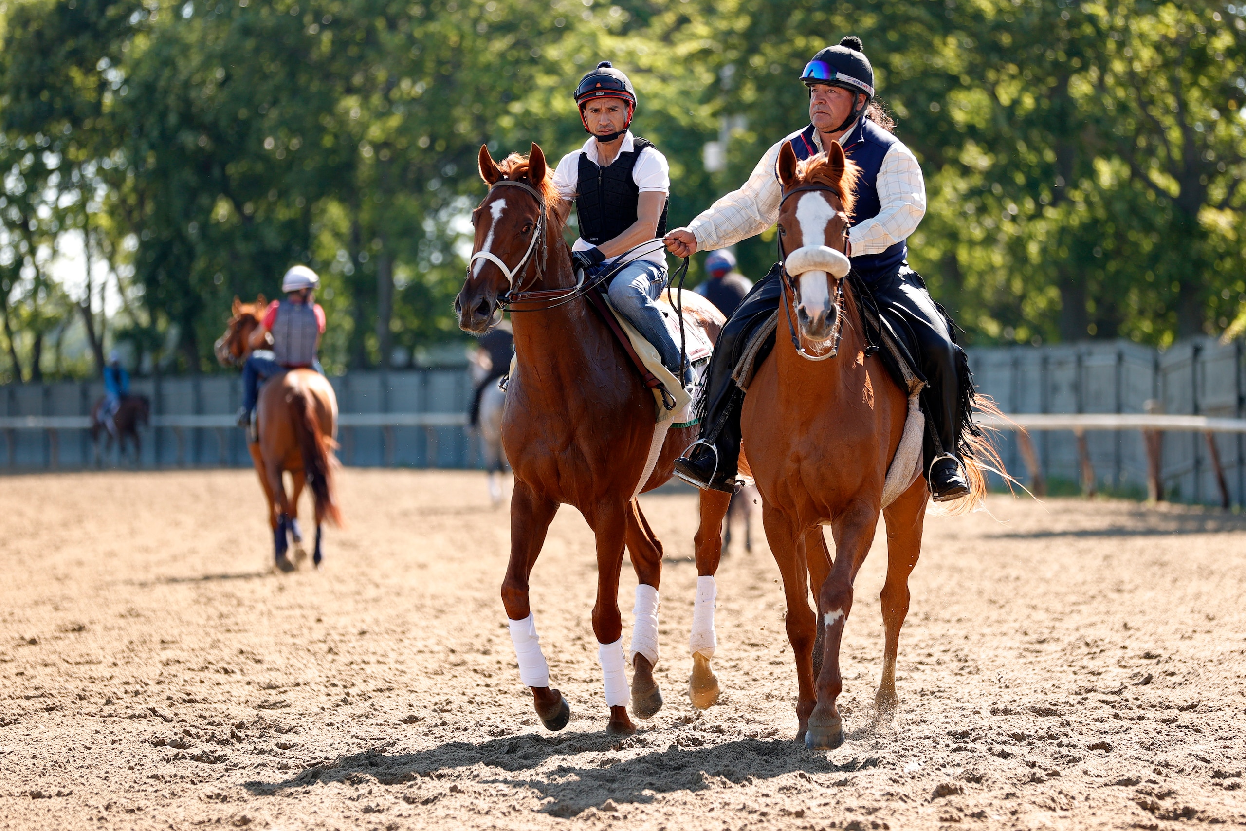 ELMONT, NEW YORK - JUNE 10: Rich Strike (L) jogs during a morning workout prior to the 154th running of the Belmont Stakes at Belmont Park on June 10, 2022 in Elmont, New York. (Photo by Sarah Stier/Getty Images)