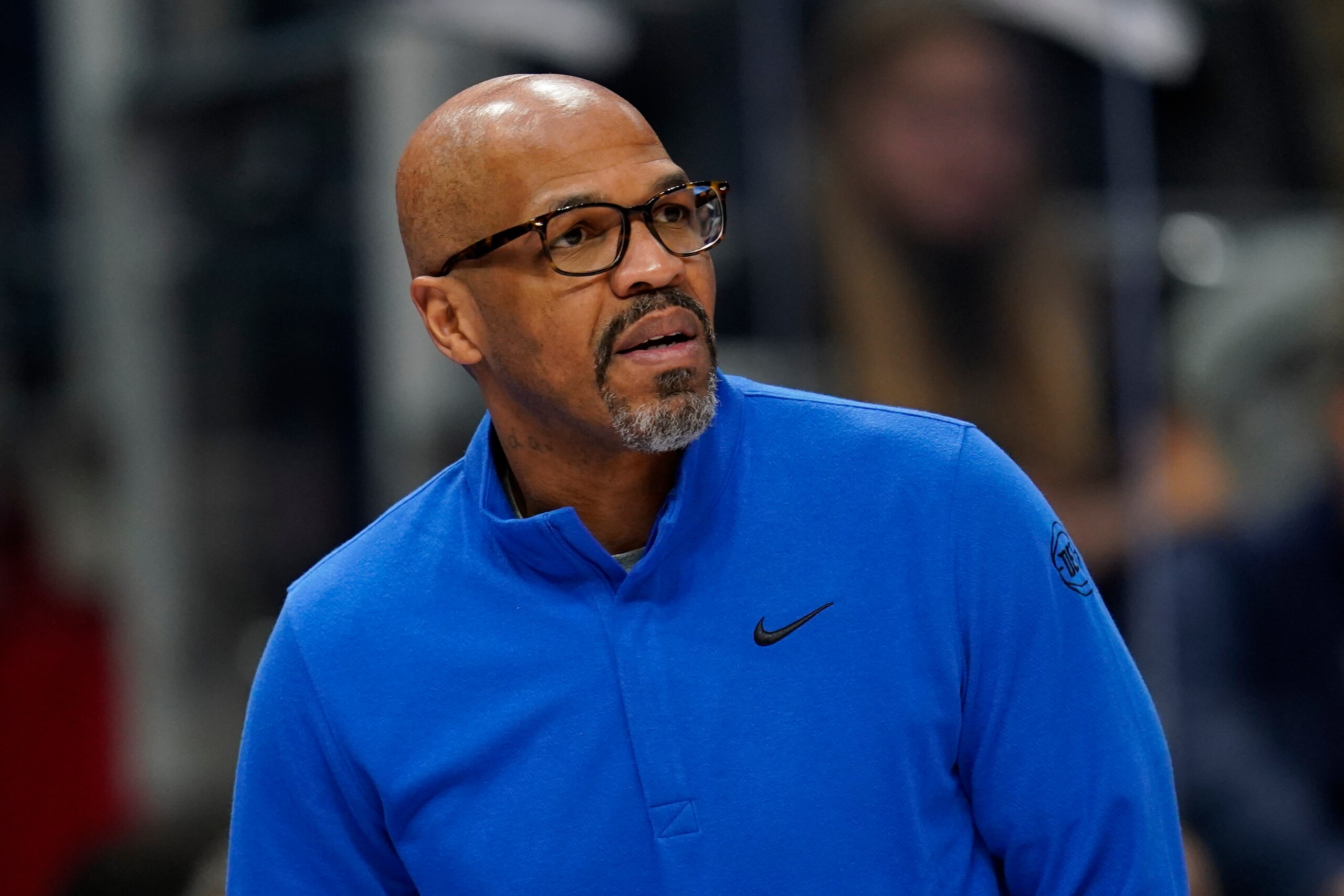 Detroit Pistons assistant coach Jerome Allen watches against the Milwaukee Bucks in the first half of an NBA basketball game in Detroit, Friday, April 8, 2022. (AP Photo/Paul Sancya)