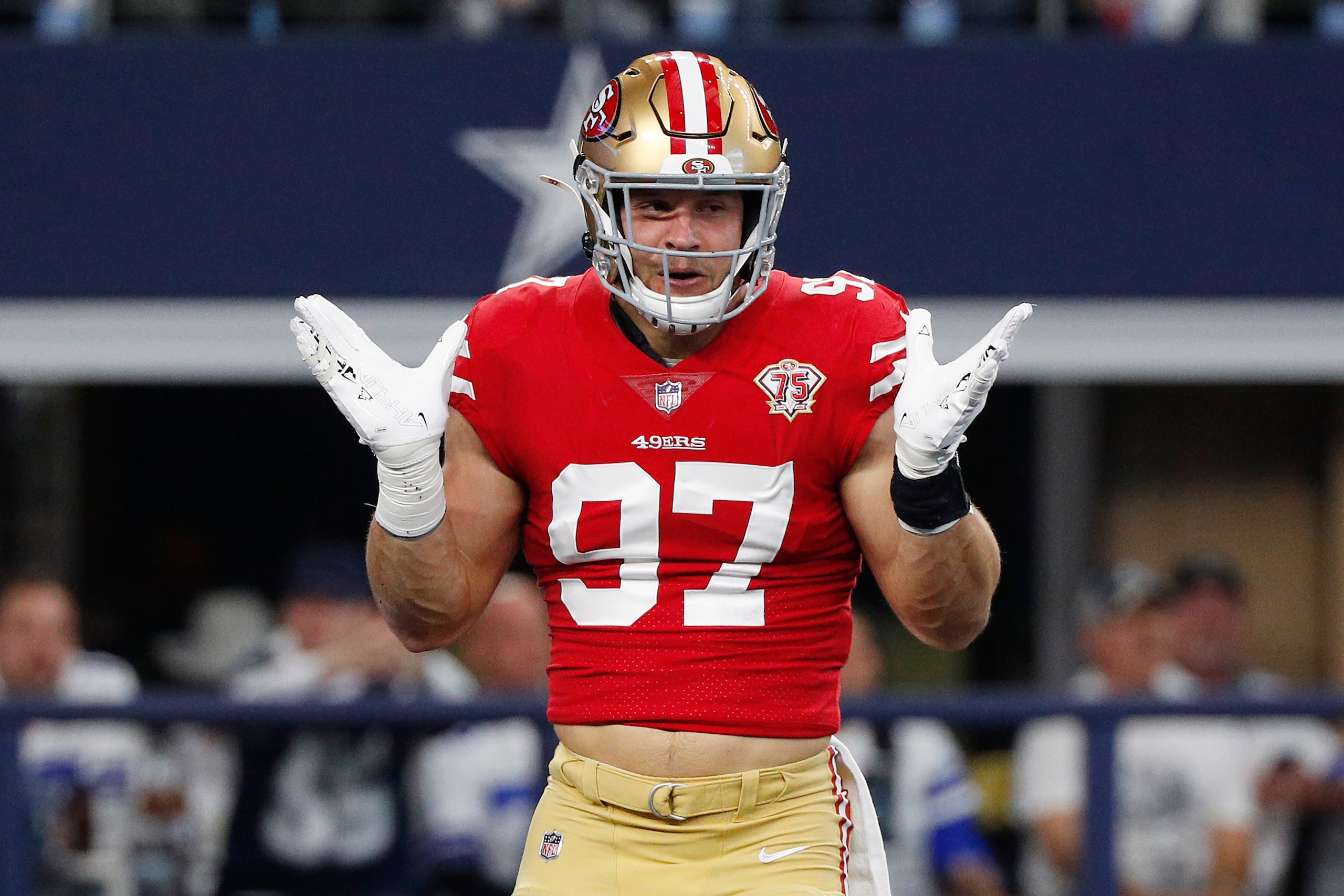 ARLINGTON, TEXAS - JANUARY 16: Nick Bosa #97 of the San Francisco 49ers reacts after a sack against the Dallas Cowboys during the first quarter in the NFC Wild Card Playoff game at AT&T Stadium on January 16, 2022 in Arlington, Texas. (Photo by Richard Rodriguez/Getty Images) ARLINGTON, TEXAS - JANUARY 16: Nick Bosa #97 of the San Francisco 49ers reacts after a sack against the Dallas Cowboys during the first quarter in the NFC Wild Card Playoff game at AT&T Stadium on January 16, 2022 in Arlington, Texas. (Photo by Richard Rodriguez/Getty Images)