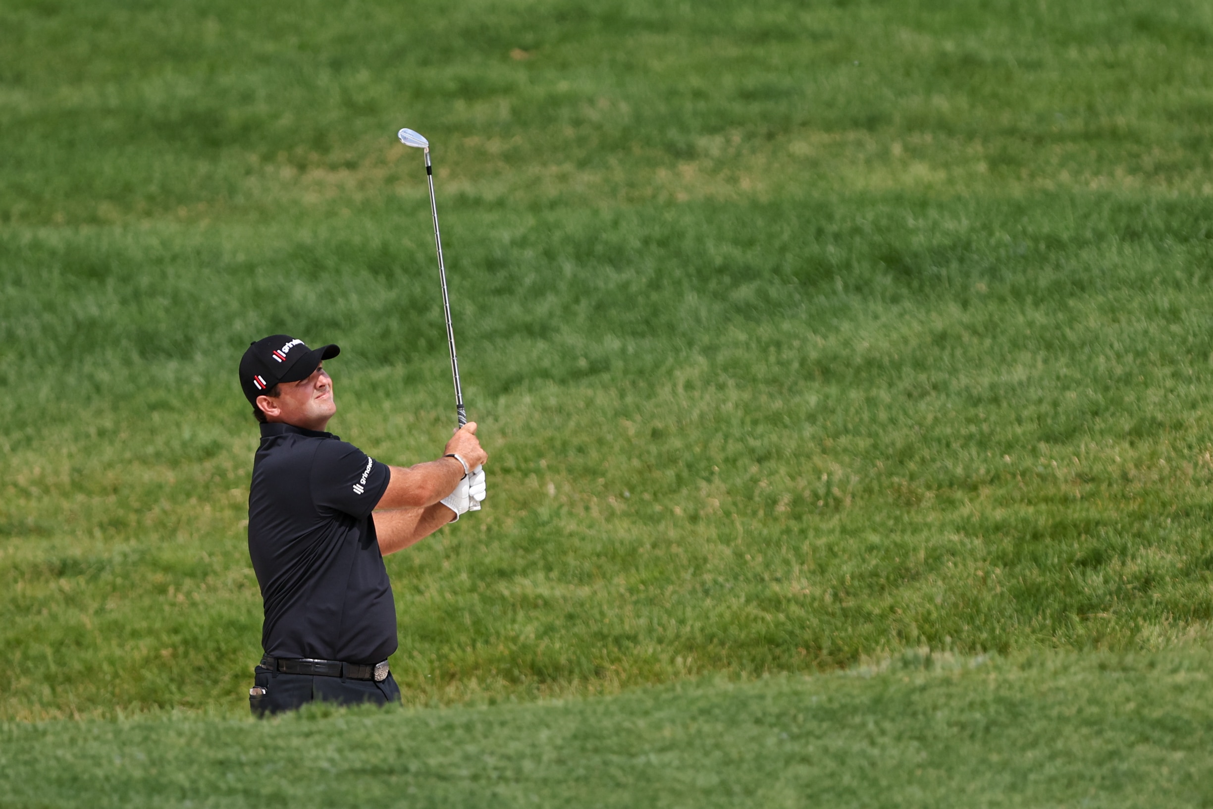 DUBLIN, OH - JUNE 05: Patrick Reed hits an approach shot out of a bunker on the 13th hole during the final round of the Memorial Tournament presented by Workday on June 5, 2022, at the Muirfield Village Golf Club in Dublin, OH. (Photo by Ian Johnson/Icon Sportswire via Getty Images)