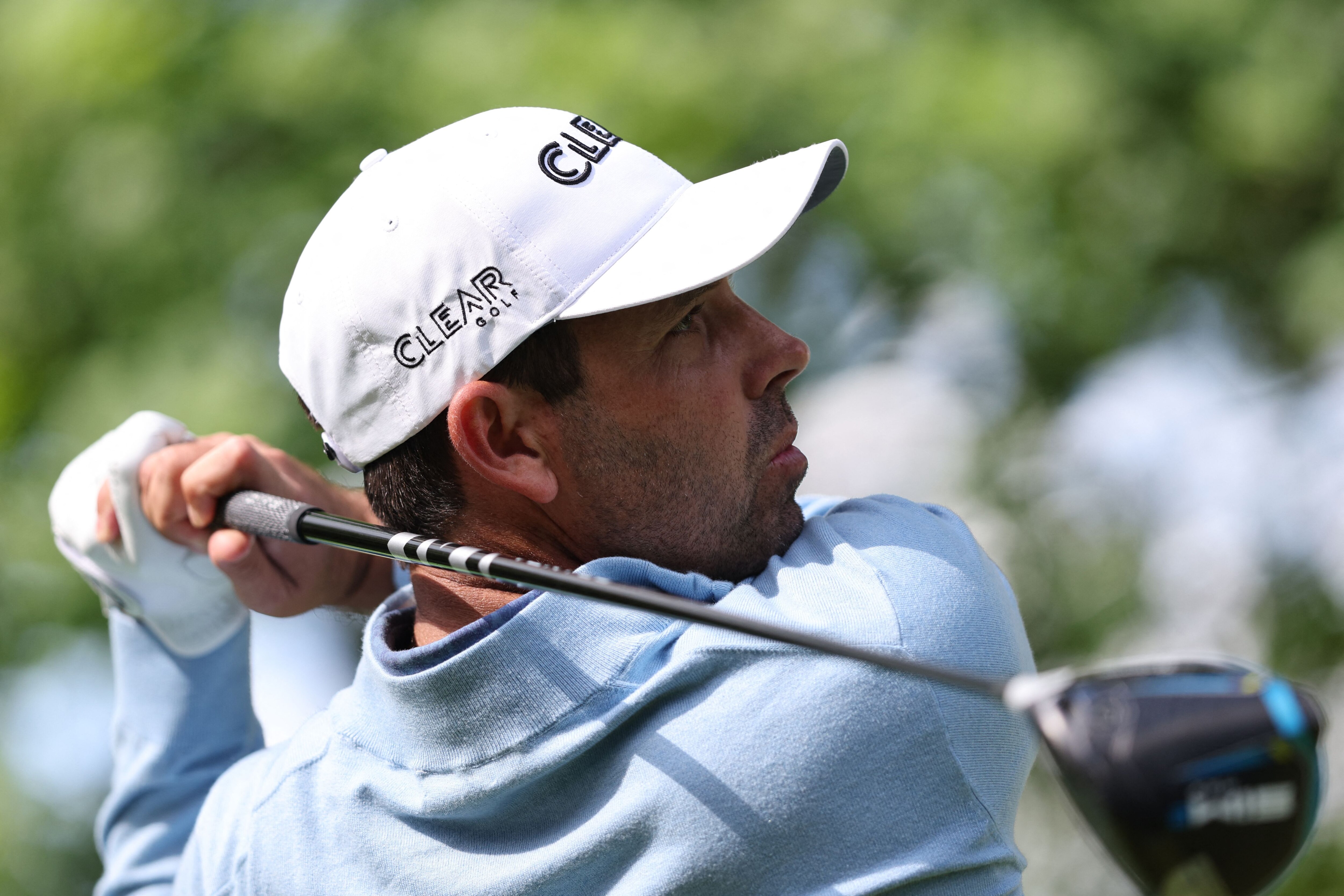 South Africa's Charl Schwartzel watches his drive from the 4th tee on the third and final day of the LIV Golf Invitational Series event at The Centurion Club in St Albans, north of London, on June 11, 2022. - The LIV Golf Invitational London, the launch event of a lucrative and divisive series that is rocking the sport reaches it's conclusion. The $25 million event in St Albans -- the biggest prize pot in history -- is the first of eight tournaments this year bankrolled by Saudi Arabia's sovereign wealth fund, worth a combined $255 million. (Photo by Adrian DENNIS / AFP) (Photo by ADRIAN DENNIS/AFP via Getty Images)
