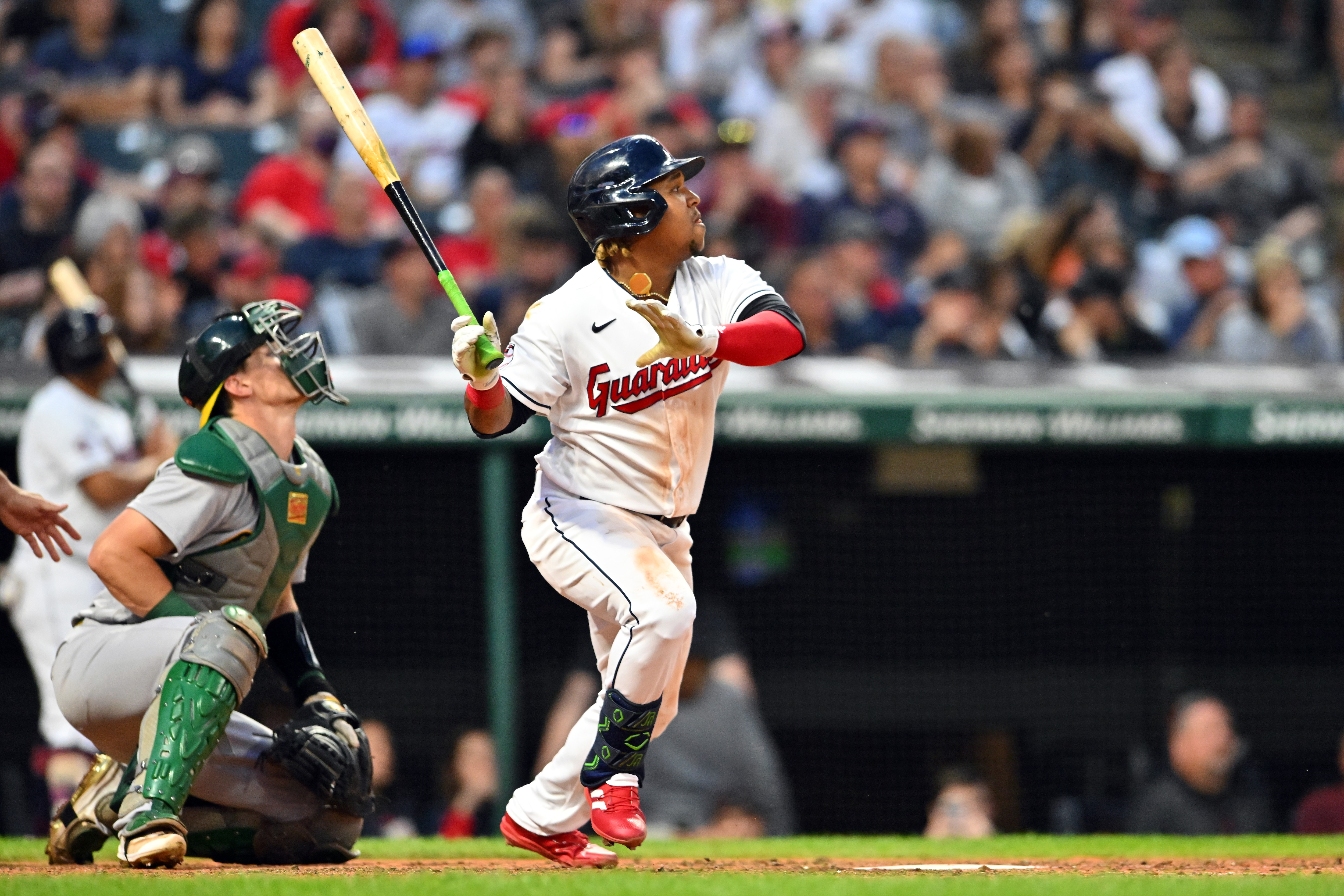 CLEVELAND, OHIO - JUNE 10: Jose Ramirez #11 of the Cleveland Guardians hits a double during the sixth inning against the Oakland Athletics at Progressive Field on June 10, 2022 in Cleveland, Ohio. (Photo by Jason Miller/Getty Images)