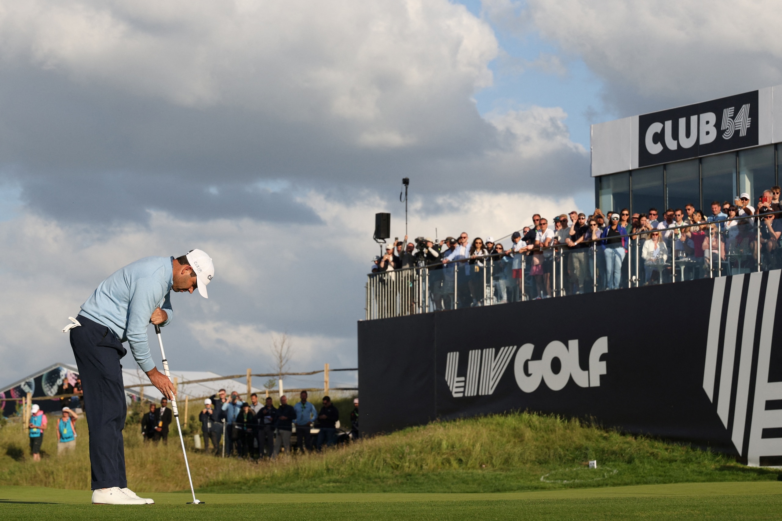 South African golfer Charl Schwartzel plays a last shot on the 18th hole during the third and final day of the LIV Golf Invitational Series event at The Centurion Club in St Albans, north of London, on June 11, 2022. - The LIV Golf Invitational London, the launch event of a lucrative and divisive series that is rocking the sport reaches it's conclusion. The $25 million event in St Albans -- the biggest prize pot in history -- is the first of eight tournaments this year bankrolled by Saudi Arabia's sovereign wealth fund, worth a combined $255 million. (Photo by Adrian DENNIS / AFP) (Photo by ADRIAN DENNIS/AFP via Getty Images)