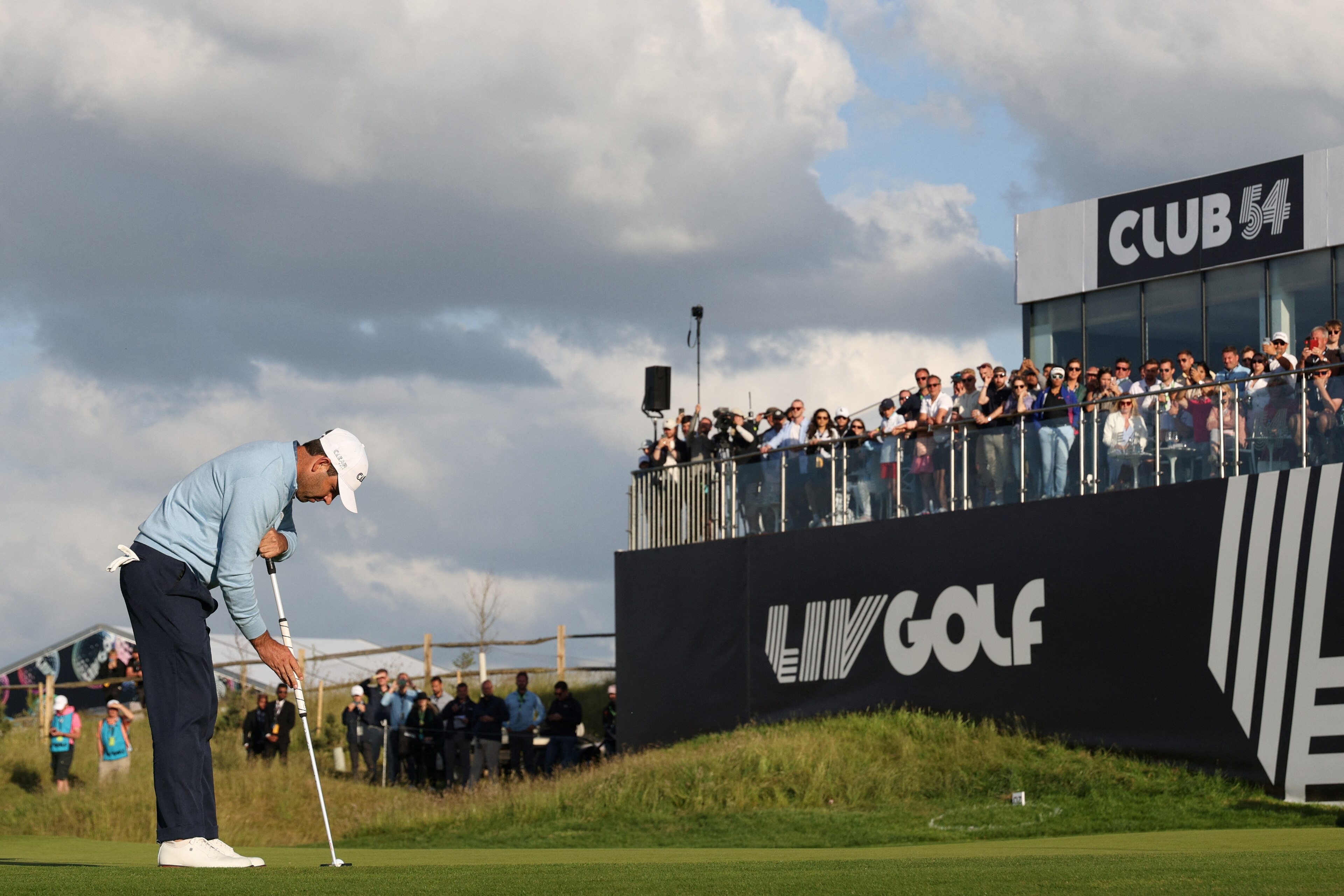 South African golfer Charl Schwartzel plays a last shot on the 18th hole during the third and final day of the LIV Golf Invitational Series event at The Centurion Club in St Albans, north of London, on June 11, 2022. - The LIV Golf Invitational London, the launch event of a lucrative and divisive series that is rocking the sport reaches it's conclusion. The $25 million event in St Albans -- the biggest prize pot in history -- is the first of eight tournaments this year bankrolled by Saudi Arabia's sovereign wealth fund, worth a combined $255 million. (Photo by Adrian DENNIS / AFP) (Photo by ADRIAN DENNIS/AFP via Getty Images)