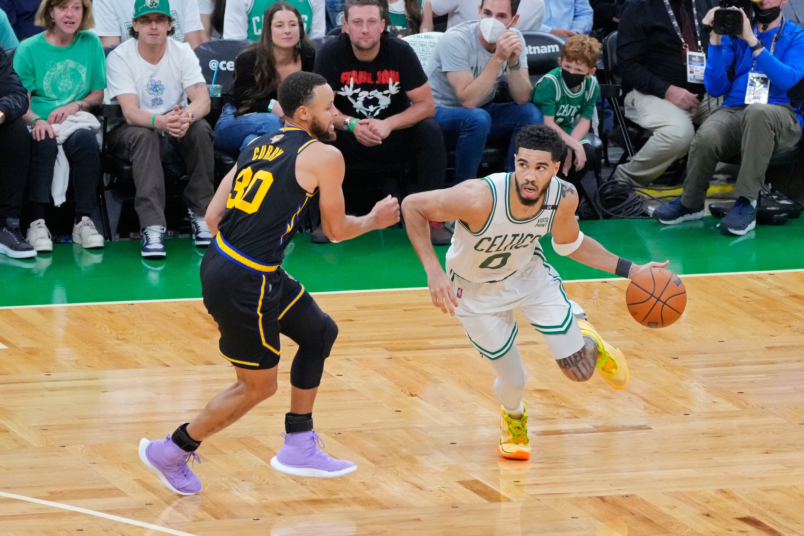 BOSTON, MA - JUNE 10: Jayson Tatum #0 of the Boston Celtics dribbles the ball around Stephen Curry #30 of the Golden State Warriors during Game Four of the 2022 NBA Finals on June 10, 2022 at TD Garden in Boston, Massachusetts. NOTE TO USER: User expressly acknowledges and agrees that, by downloading and or using this photograph, user is consenting to the terms and conditions of Getty Images License Agreement. Mandatory Copyright Notice: Copyright 2022 NBAE (Photo by Mark Blinch/NBAE via Getty Images)