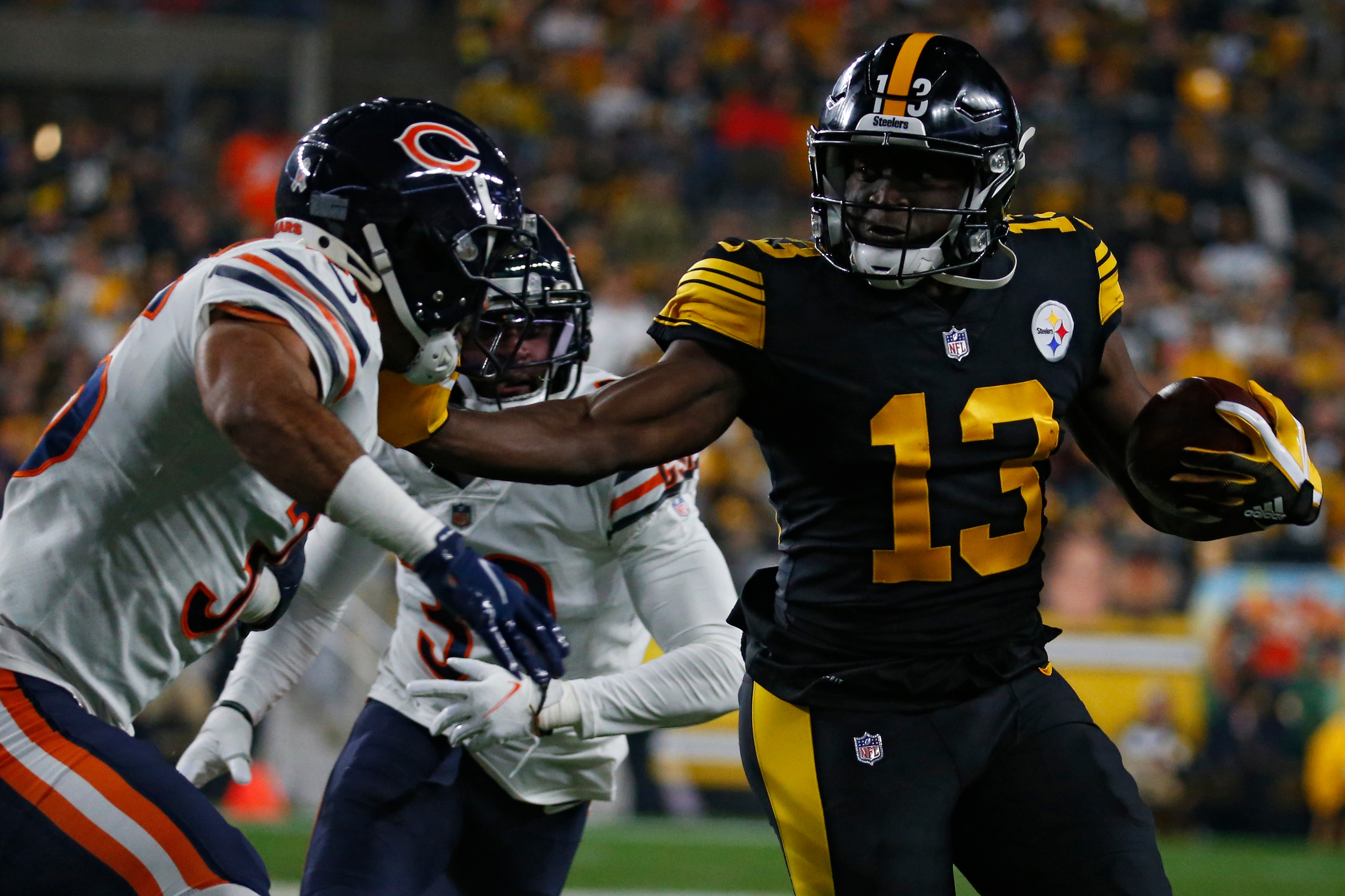 PITTSBURGH, PENNSYLVANIA - NOVEMBER 08: Wide receiver James Washington #13 of the Pittsburgh Steelers rushes with ball against the Chicago Bears during the first half at Heinz Field on November 8, 2021 in Pittsburgh, Pennsylvania. (Photo by Justin K. Aller/Getty Images)
