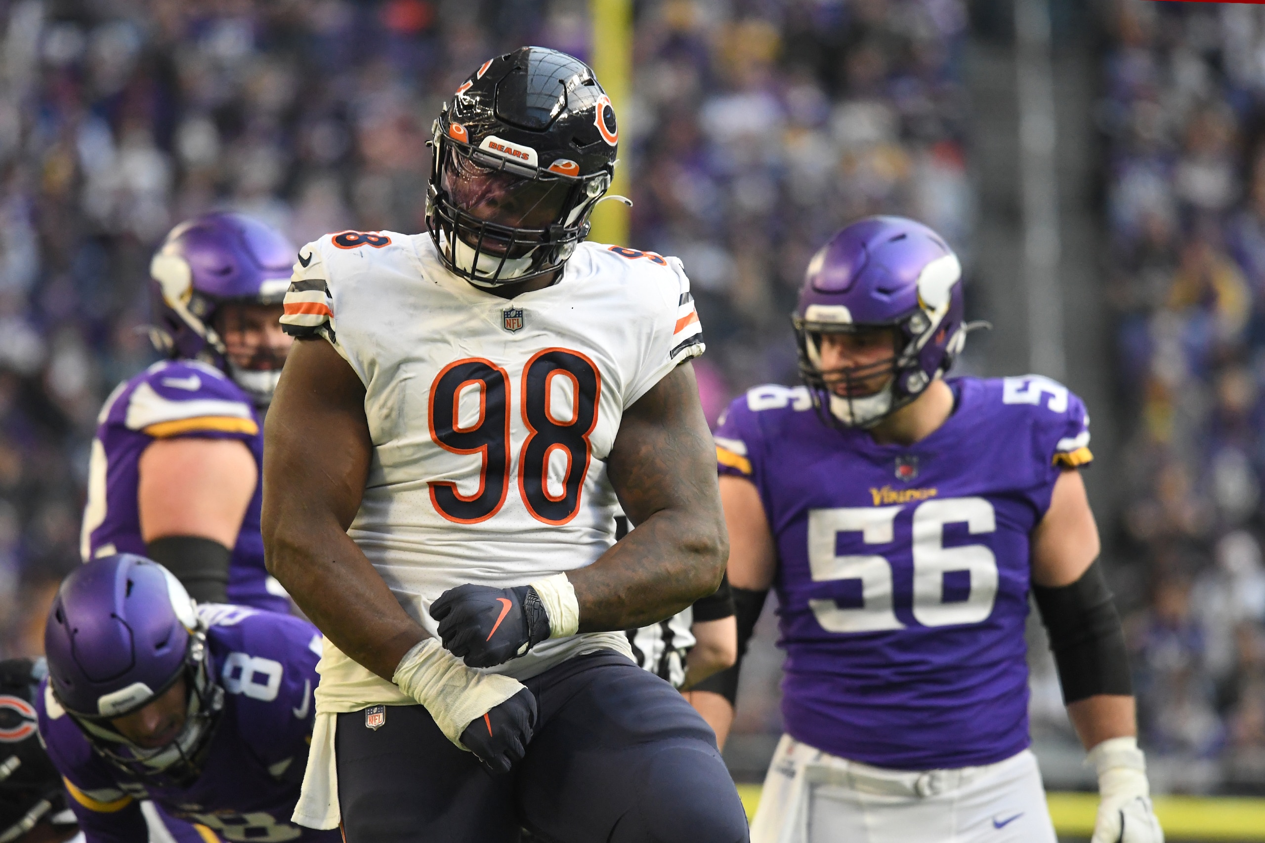 MINNEAPOLIS, MN - JANUARY 09: Chicago Bears Defensive End Bilal Nichols (98) celebrates his sack of Minnesota Vikings Quarterback Kirk Cousins (8) during a game between the Minnesota Vikings and Chicago Bears on January 9, 2022, at U.S. Bank Stadium in Minneapolis, MN.(Photo by Nick Wosika/Icon Sportswire via Getty Images)