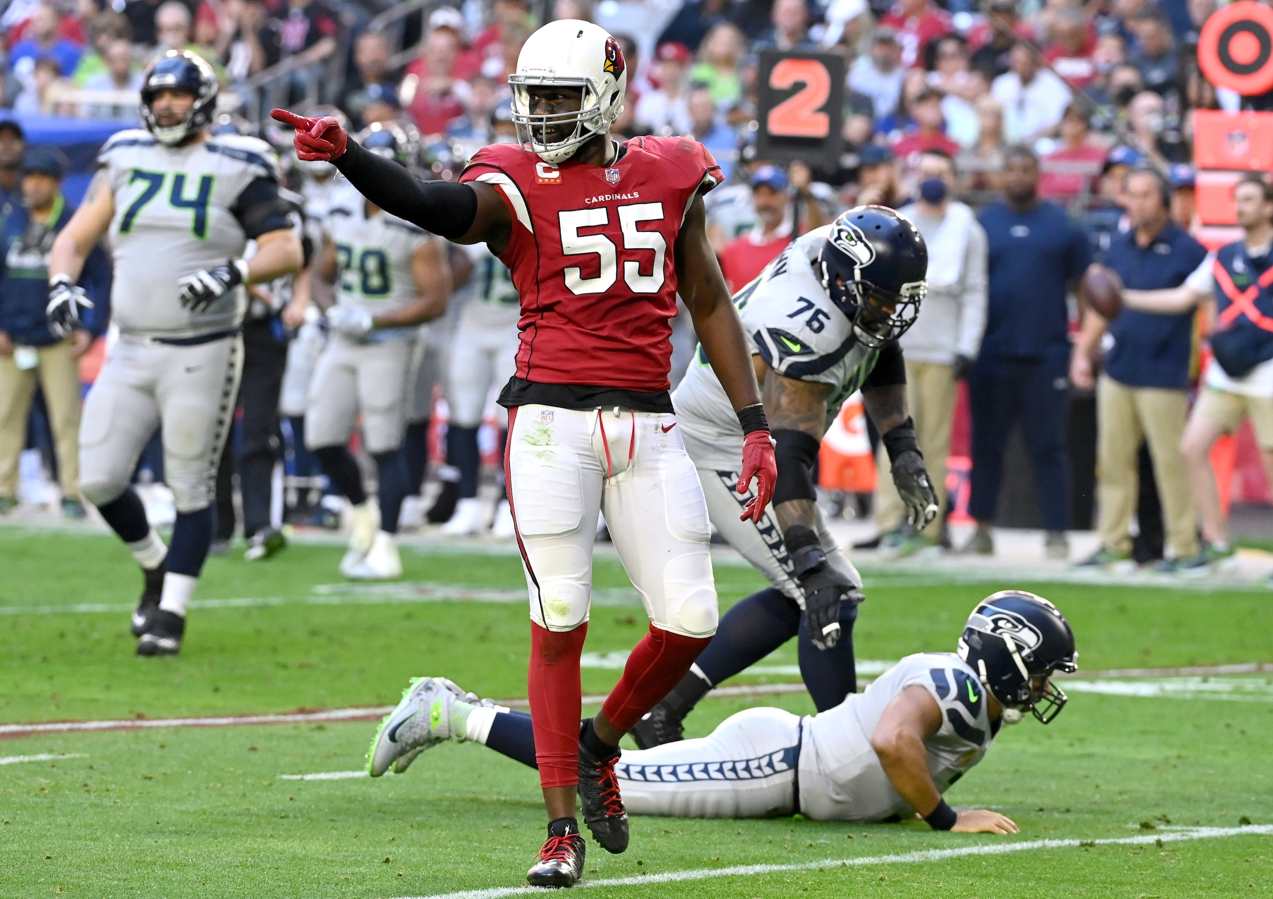 GLENDALE, ARIZONA - JANUARY 09: Chandler Jones #55 of the Arizona Cardinals celebrates after hitting Russell Wilson #3 of the Seattle Seahawks during the second quarter at State Farm Stadium on January 09, 2022 in Glendale, Arizona. (Photo by Norm Hall/Getty Images)