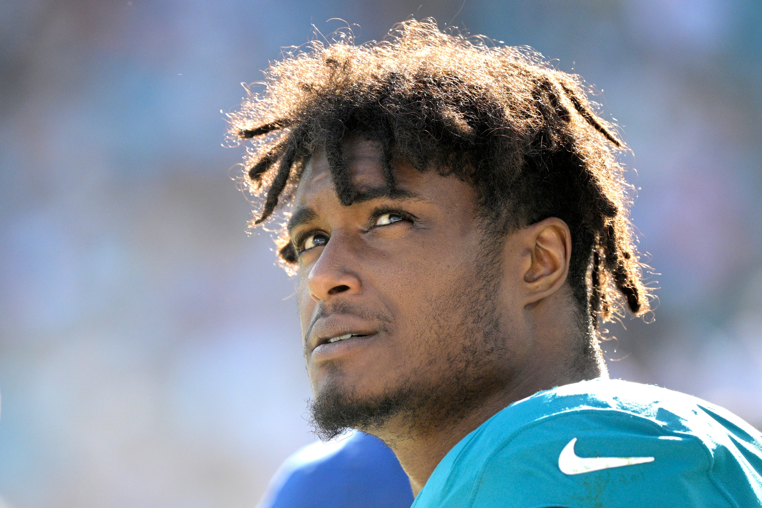 Jacksonville Jaguars outside linebacker Myles Jack watches from the sideline during the second half of an NFL football game against the Indianapolis Colts, Sunday, Jan. 9, 2022, in Jacksonville, Fla. (AP Photo/Phelan M. Ebenhack)
