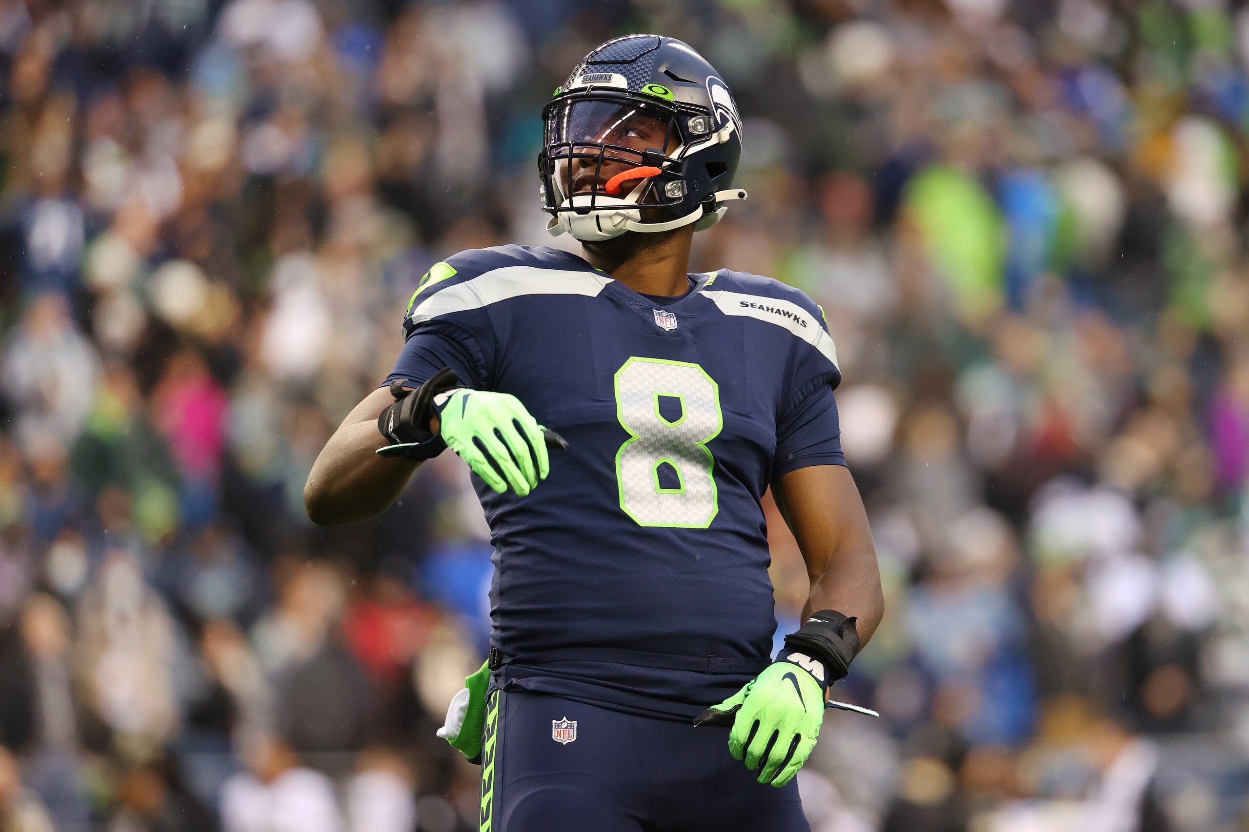 SEATTLE, WASHINGTON - OCTOBER 25: Carlos Dunlap #8 of the Seattle Seahawks reacts against the New Orleans Saints during the first quarter at Lumen Field on October 25, 2021 in Seattle, Washington. (Photo by Abbie Parr/Getty Images)