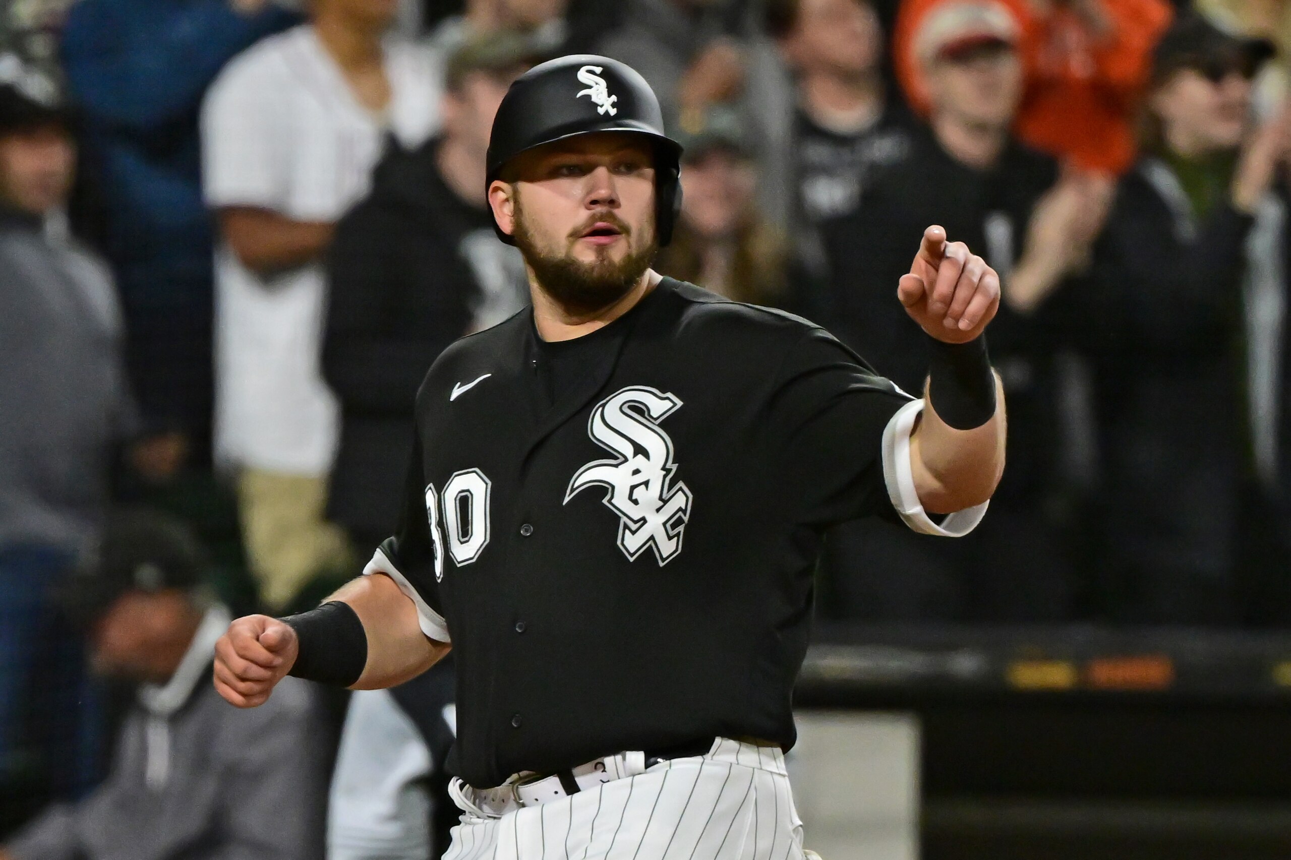 CHICAGO, ILLINOIS - JUNE 07: Jake Burger #30 of the Chicago White Sox reacts after scoring in the sixth inning against the Los Angeles Dodgers at Guaranteed Rate Field on June 07, 2022 in Chicago, Illinois. (Photo by Quinn Harris/Getty Images)