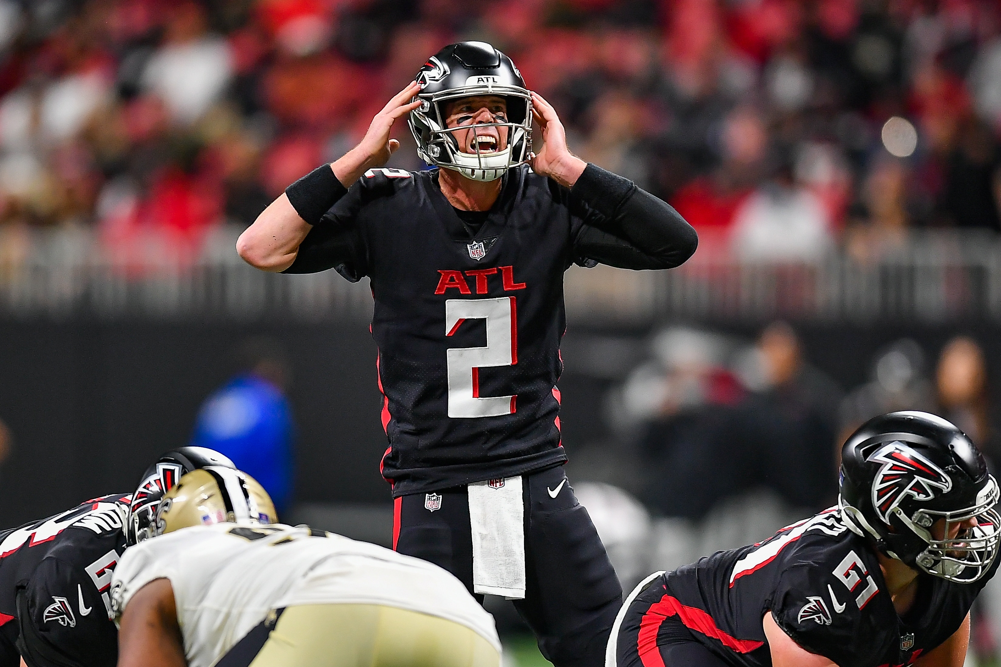 ATLANTA, GA  JANUARY 09:  Atlanta quarterback Matt Ryan (2) audibles at the line of scrimmage during the NFL game between the New Orleans Saints and the Atlanta Falcons on January 9th, 2022 at Mercedes-Benz Stadium in Atlanta, GA.  (Photo by Rich von Biberstein/Icon Sportswire via Getty Images)