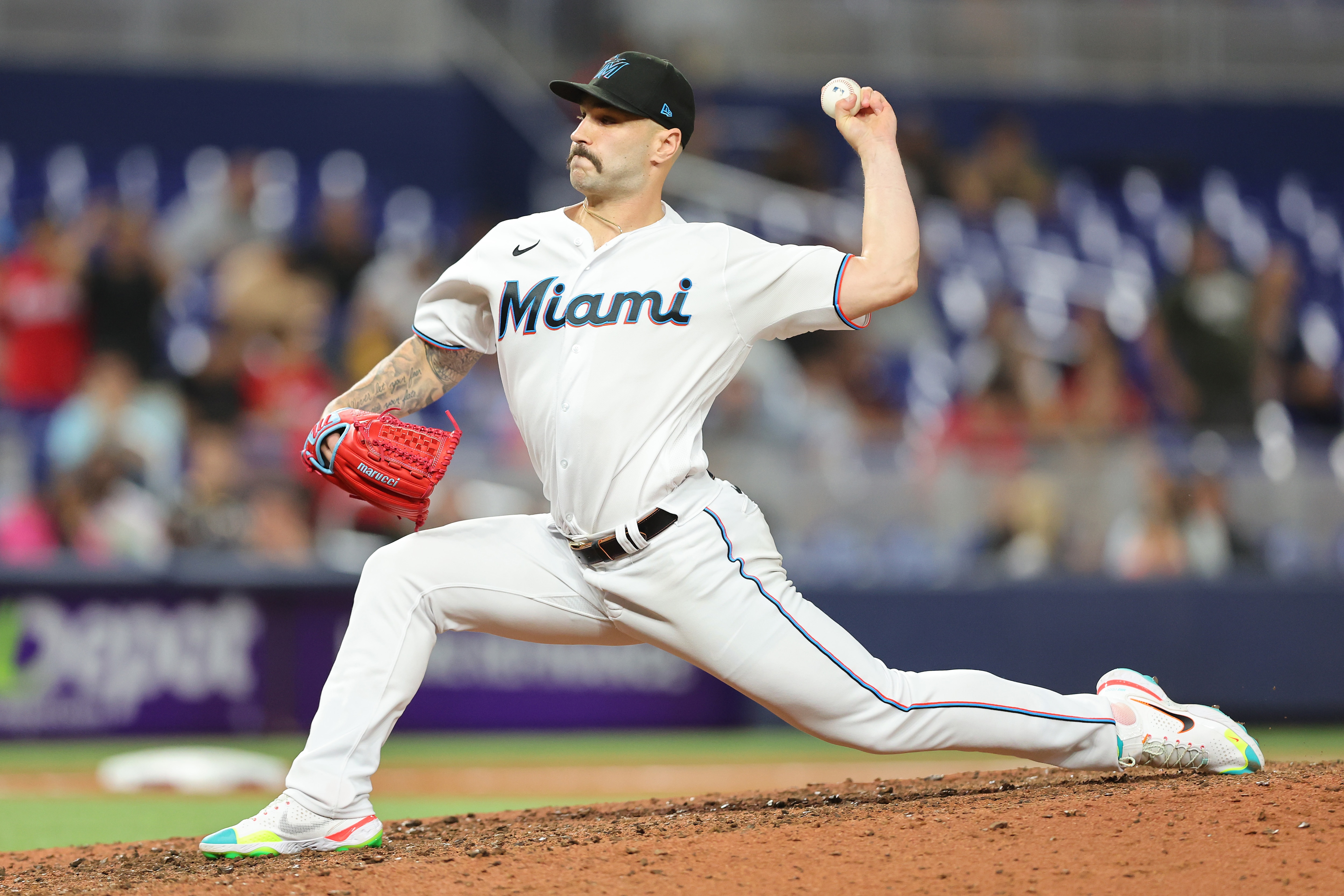 MIAMI, FLORIDA - JUNE 09: Tanner Scott #66 of the Miami Marlins delivers a pitch during the ninth inning against the Washington Nationals at loanDepot park on June 09, 2022 in Miami, Florida. (Photo by Michael Reaves/Getty Images)