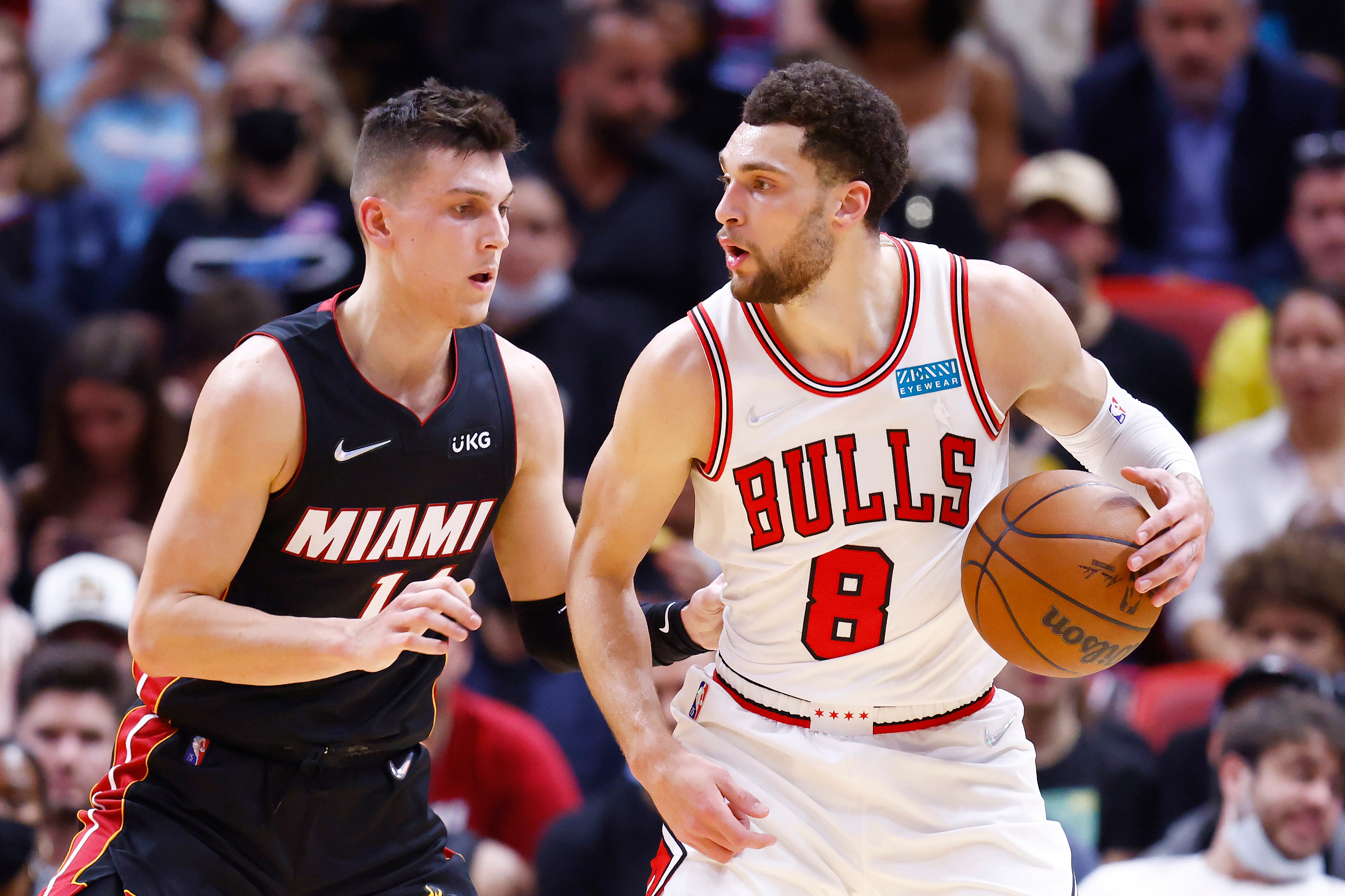 MIAMI, FLORIDA - DECEMBER 11: Zach LaVine #8 of the Chicago Bulls is defended by Tyler Herro #14 of the Miami Heat during the first half at FTX Arena on December 11, 2021 in Miami, Florida. NOTE TO USER: User expressly acknowledges and agrees that, by downloading and or using this photograph, User is consenting to the terms and conditions of the Getty Images License Agreement. (Photo by Michael Reaves/Getty Images)
