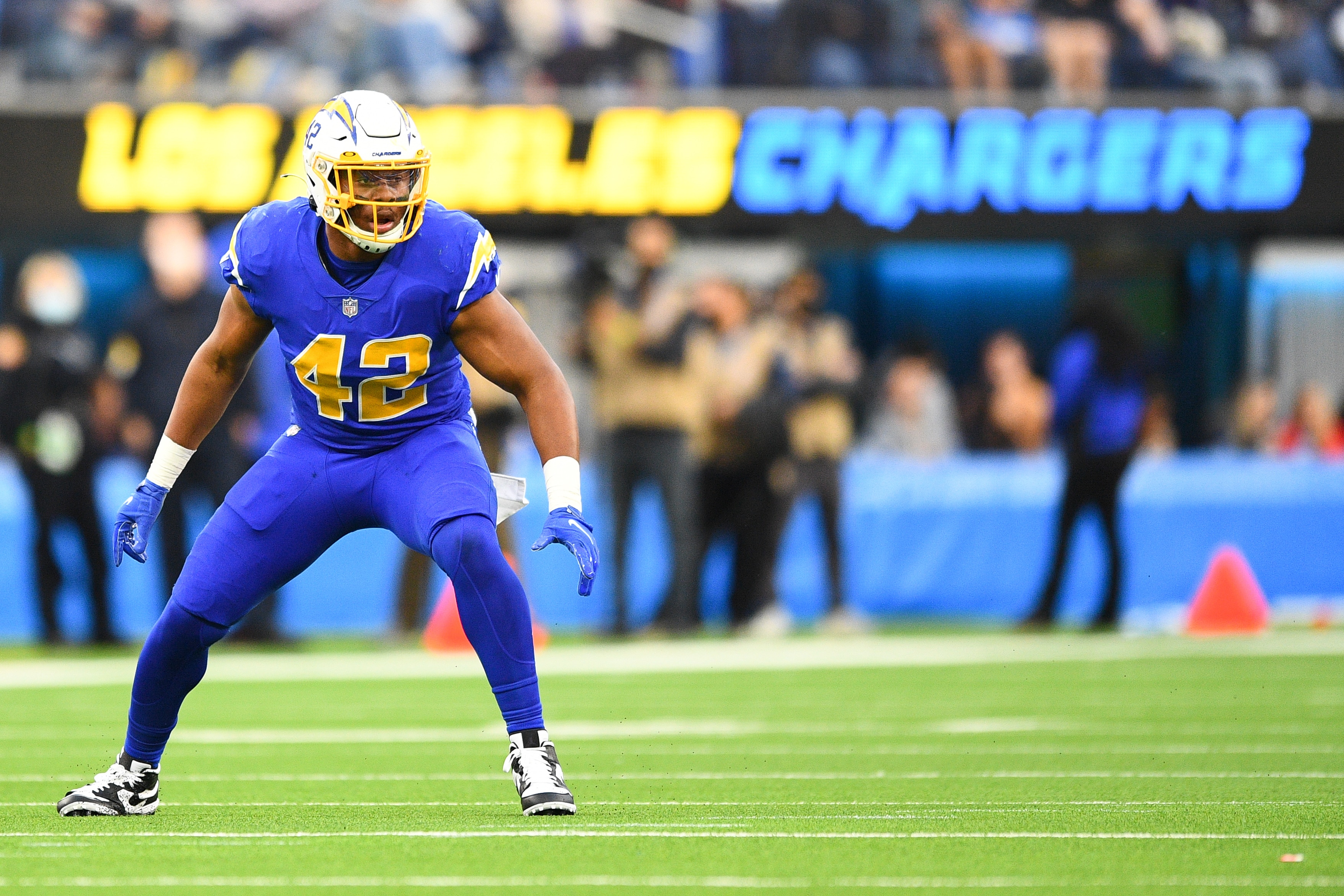 INGLEWOOD, CA - DECEMBER 12: Los Angeles Chargers Defensive End Uchenna Nwosu (42) looks on during the NFL game between the New York Giants and the Los Angeles Chargers on December 12, 2021, at SoFi Stadium in Inglewood, CA. (Photo by Brian Rothmuller/Icon Sportswire via Getty Images)