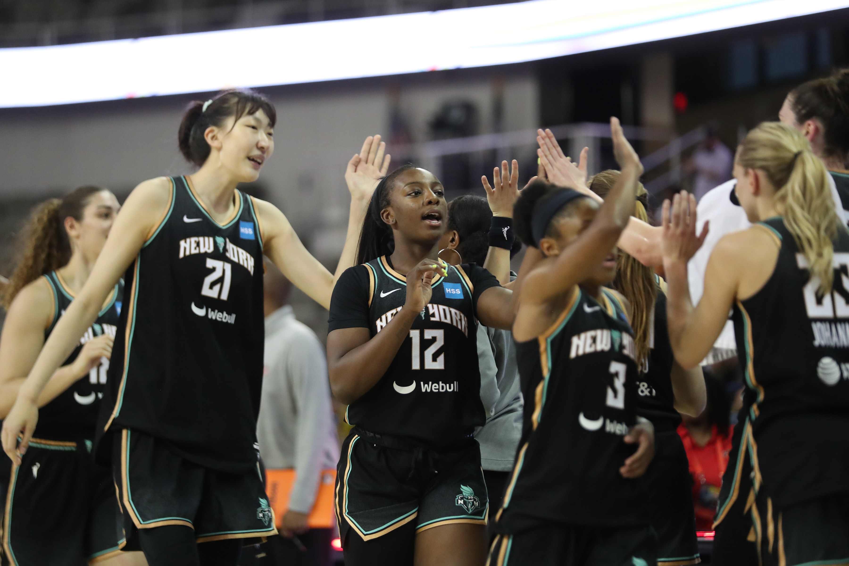 INDIANAPOLIS, IN  - JUNE 10: New York Liberty high fives team after the game against the Indiana Fever  on June 10, 2022 at Gainbridge Fieldhouse in Indianapolis, Indiana. NOTE TO USER: User expressly acknowledges and agrees that, by downloading and or using this Photograph, user is consenting to the terms and conditions of the Getty Images License Agreement. Mandatory Copyright Notice: Copyright 2022 NBAE (Photo by Pepper Robinson/NBAE via Getty Images)