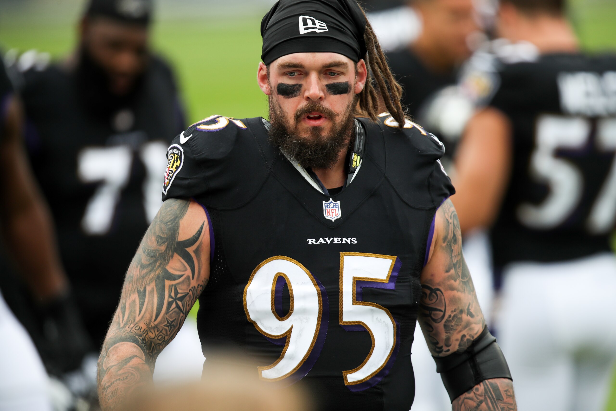 BALTIMORE, MD - NOVEMBER 22:Baltimore Ravens defensive end Derek Wolfe (95) walks the sidelines during the game between the Tennessee Titans and the Baltimore Ravens on November 22, 2020 at M&T Bank Stadium in Baltimore, Maryland (Photo by Nicole Fridling/Icon Sportswire via Getty Images) BALTIMORE, MD - NOVEMBER 22:Baltimore Ravens defensive end Derek Wolfe (95) walks the sidelines during the game between the Tennessee Titans and the Baltimore Ravens on November 22, 2020 at M&T Bank Stadium in Baltimore, Maryland (Photo by Nicole Fridling/Icon Sportswire via Getty Images)