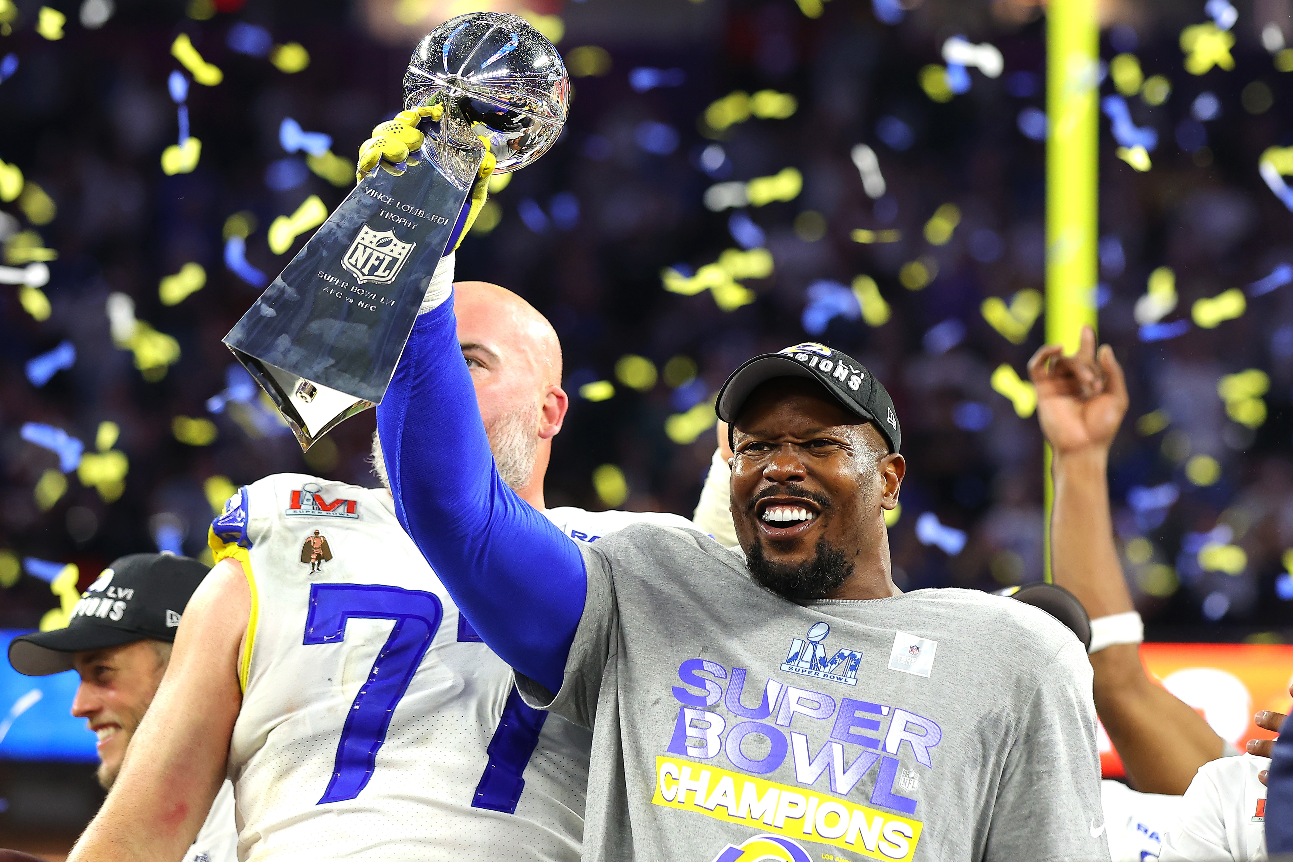INGLEWOOD, CALIFORNIA - FEBRUARY 13: Von Miller #40 of the Los Angeles Rams holds up the Vince Lombardi Trophy  after Super Bowl LVI at SoFi Stadium on February 13, 2022 in Inglewood, California. The Los Angeles Rams defeated the Cincinnati Bengals 23-20.  (Photo by Kevin C. Cox/Getty Images)