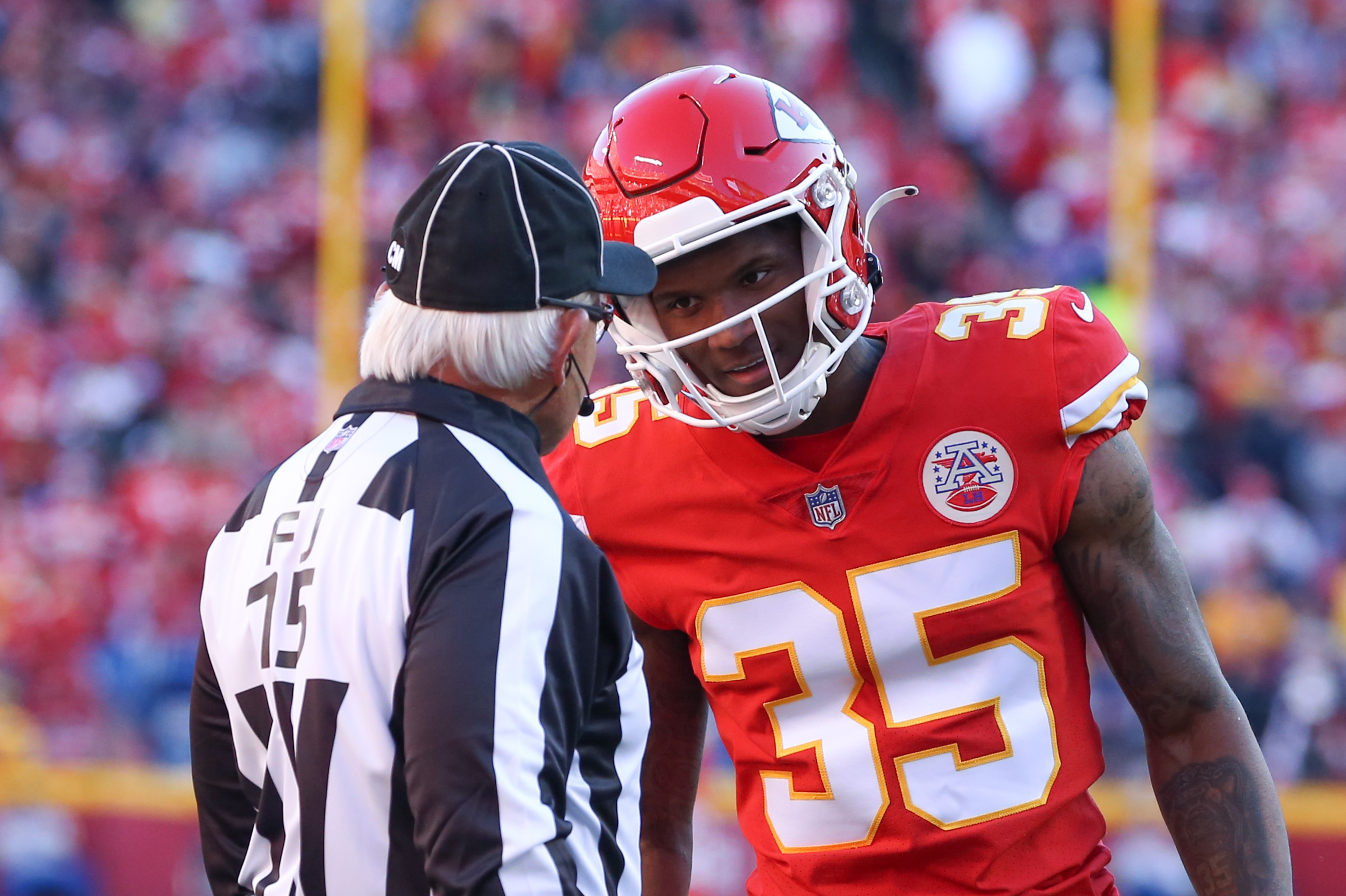 KANSAS CITY, MO - DECEMBER 12: Kansas City Chiefs cornerback Charvarius Ward (35) disputes a penalty with field judge Rick Patterson (15) in the fourth quarter of an NFL game between the Las Vegas Raiders and Kansas City Chiefs on Dec 12, 2021 at GEHA Field at Arrowhead Stadium in Kansas City, MO. (Photo by Scott Winters/Icon Sportswire via Getty Images)