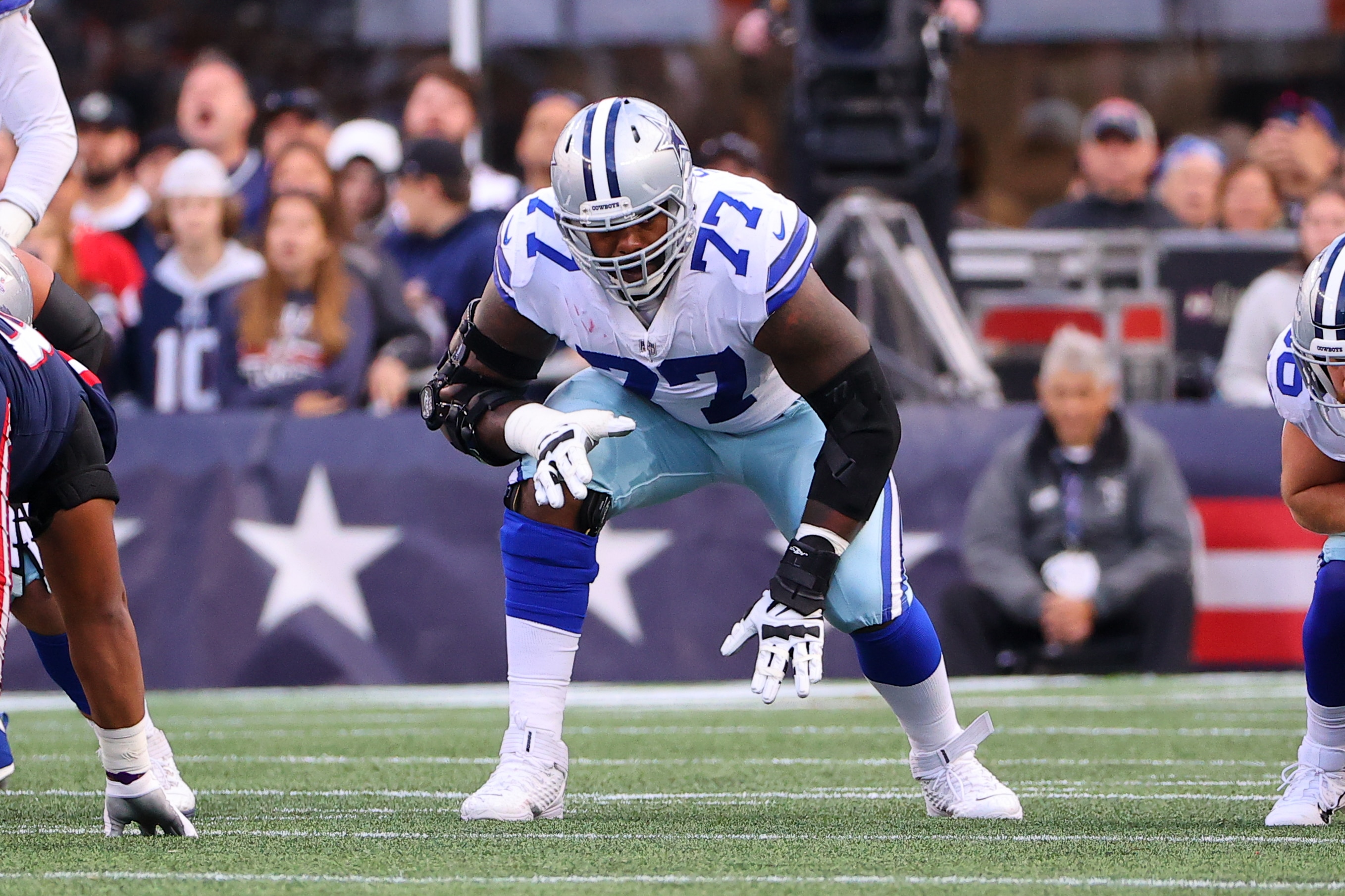 FOXBOROUGH, MA - OCTOBER 17:  Dallas Cowboys offensive tackle Tyron Smith (77) during the National Football League game between the New England Patriots and the Dallas Cowboys on October 17, 2021 at Gillette Stadium in Foxborough, MA.    (Photo by Rich Graessle/Icon Sportswire via Getty Images)