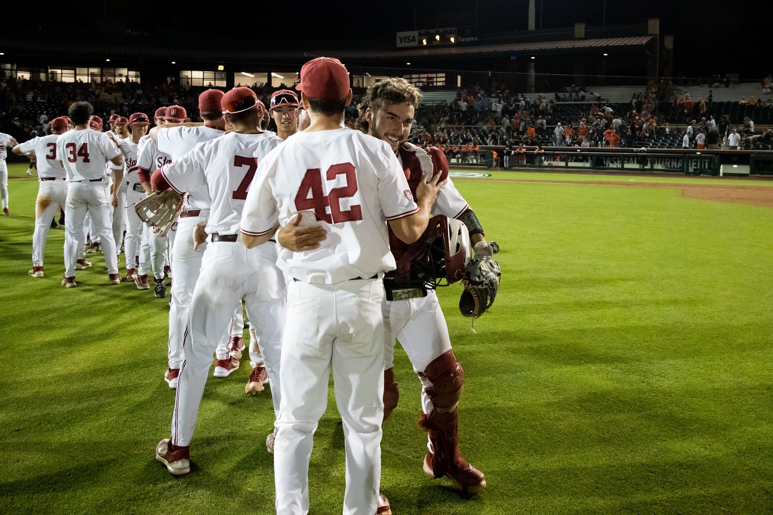 SCOTTSDALE, AZ - MAY 29: Stanford Cardinal Outfielder Joe Lomuscio (42) and Stanford Cardinal Catcher Kody Huff (25) celebrates after winning the PAC-12 Baseball Championship game between the Stanford Cardinal and the Oregon State Beavers on May 29, 2022, at Scottsdale Stadium, in Scottsdale, AZ. (Photo by Zac BonDurant/Icon Sportswire via Getty Images)