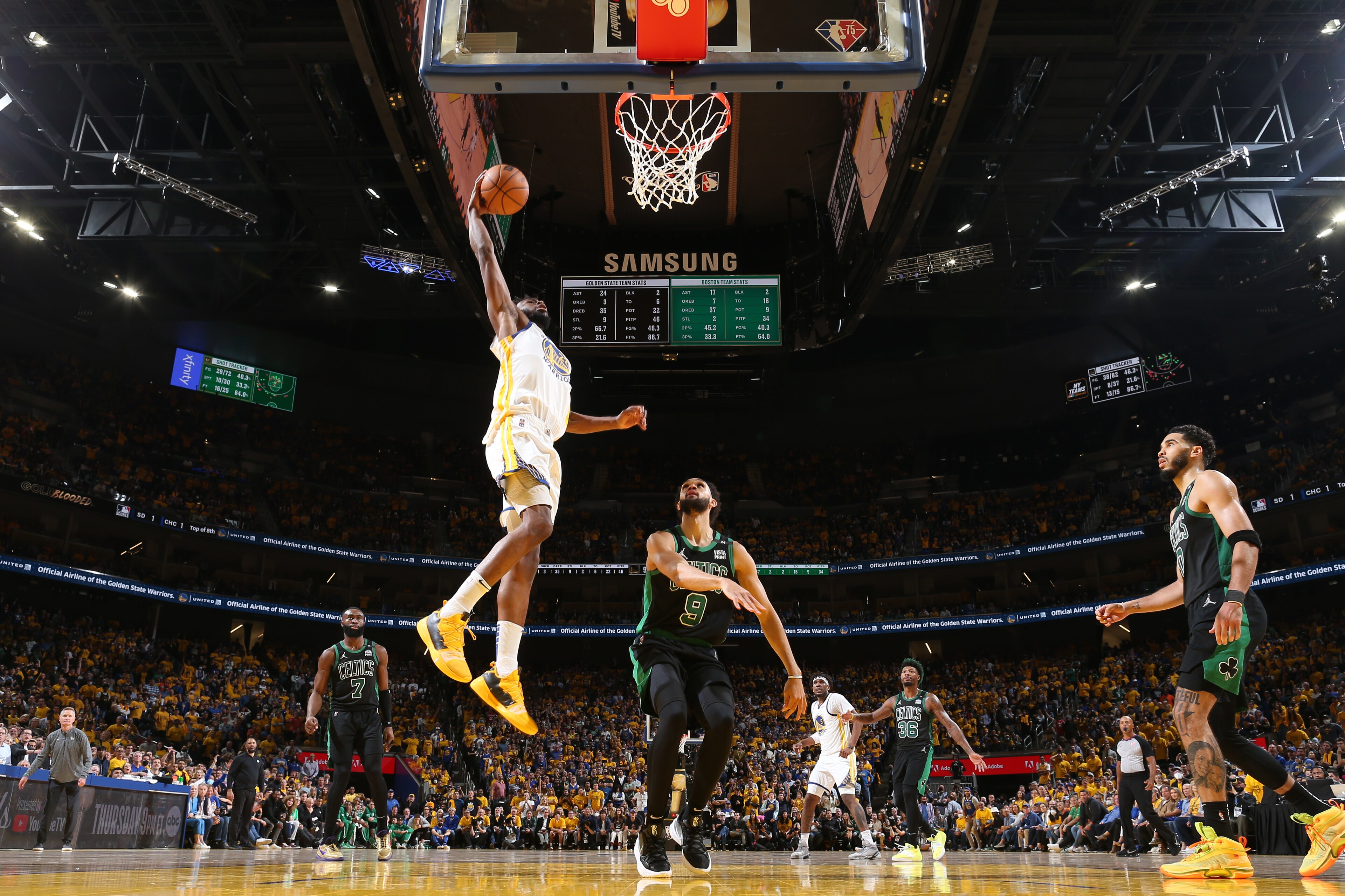 SAN FRANCISCO, CA - JUNE 13: Andrew Wiggins #22 of the Golden State Warriors dunks the ball against the Boston Celtics during Game Five of the 2022 NBA Finals on June 13, 2022 at Chase Center in San Francisco, California. NOTE TO USER: User expressly acknowledges and agrees that, by downloading and or using this photograph, user is consenting to the terms and conditions of Getty Images License Agreement. Mandatory Copyright Notice: Copyright 2022 NBAE (Photo by Nathaniel S. Butler/NBAE via Getty Images) SAN FRANCISCO, CA - JUNE 13: Andrew Wiggins #22 of the Golden State Warriors dunks the ball against the Boston Celtics during Game Five of the 2022 NBA Finals on June 13, 2022 at Chase Center in San Francisco, California. NOTE TO USER: User expressly acknowledges and agrees that, by downloading and or using this photograph, user is consenting to the terms and conditions of Getty Images License Agreement. Mandatory Copyright Notice: Copyright 2022 NBAE (Photo by Nathaniel S. Butler/NBAE via Getty Images)