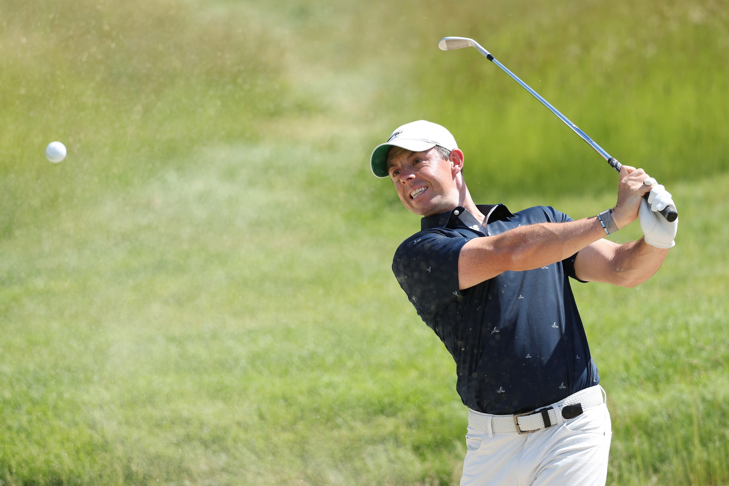 BROOKLINE, MASSACHUSETTS - JUNE 13: Rory McIlroy of Northern Ireland plays a shot on the third hole during a practice round prior to the 2022 U.S. Open at The Country Club on June 13, 2022 in Brookline, Massachusetts. (Photo by Warren Little/Getty Images)