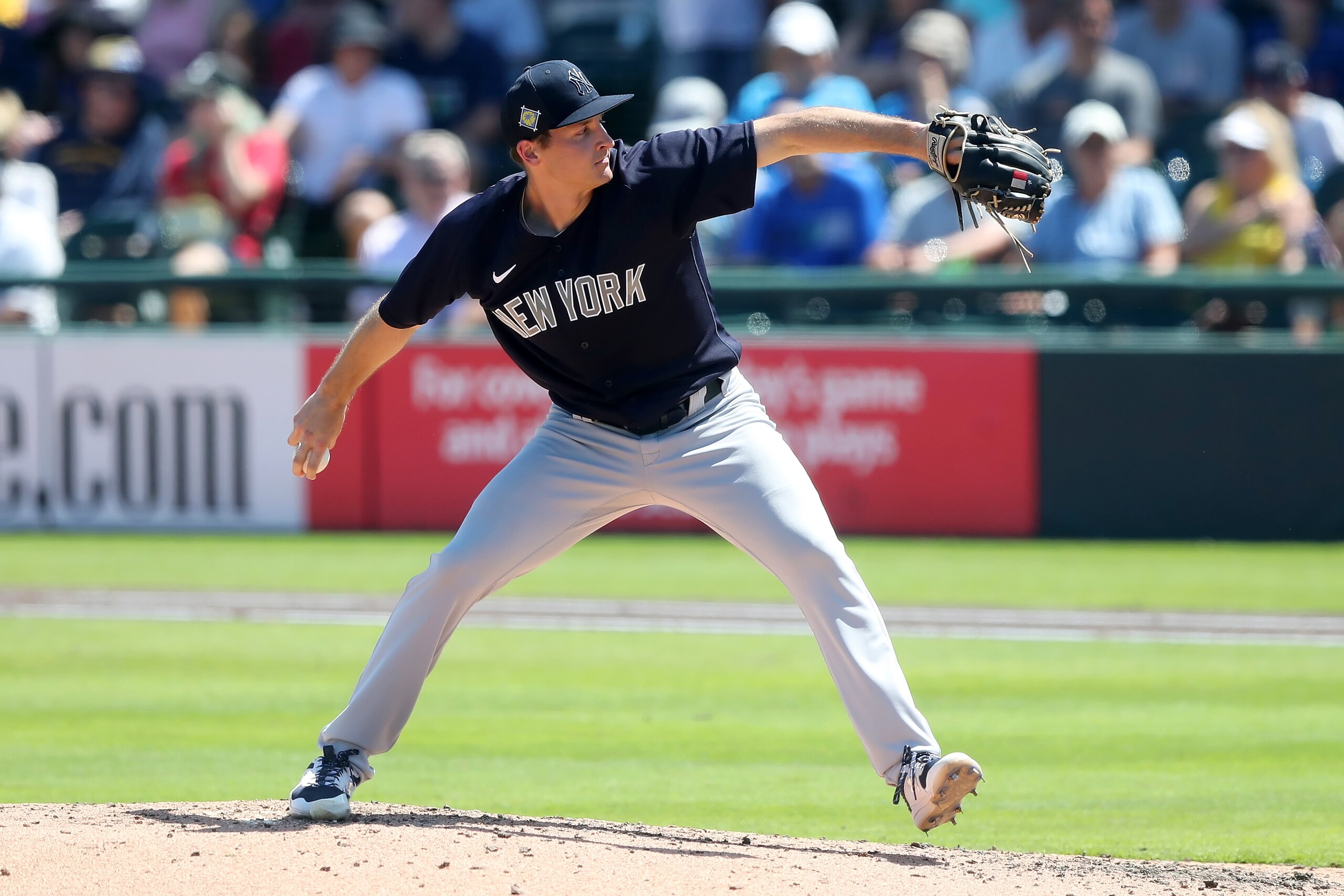 BRADENTON, FL - MARCH 18: New York Yankees Pitcher Hayden Wesneski (19) delivers a pitch to the plate during the spring training game between the New York Yankees and the Pittsburgh Pirates on March 18, 2022, at LECOM Park in Bradenton, FL. (Photo by Cliff Welch/Icon Sportswire via Getty Images) BRADENTON, FL - MARCH 18: New York Yankees Pitcher Hayden Wesneski (19) delivers a pitch to the plate during the spring training game between the New York Yankees and the Pittsburgh Pirates on March 18, 2022, at LECOM Park in Bradenton, FL. (Photo by Cliff Welch/Icon Sportswire via Getty Images)