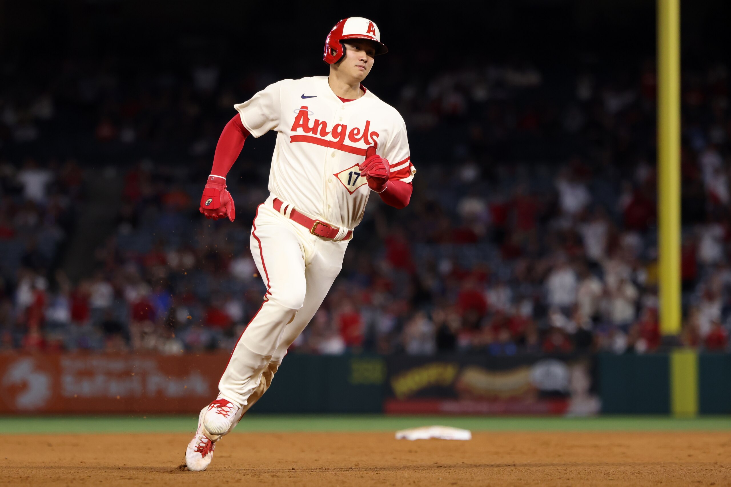ANAHEIM, CA - JUNE 11: Shohei Ohtani #17 of the Los Angeles Angels rounds the bases to score on a triple by Jared Walsh #20 in the eighth inning during the game between the New York Mets and the Los Angeles Angels at Angel Stadium on Saturday, June 11, 2022 in Anaheim, California. (Photo by Katelyn Mulcahy/MLB Photos via Getty Images)