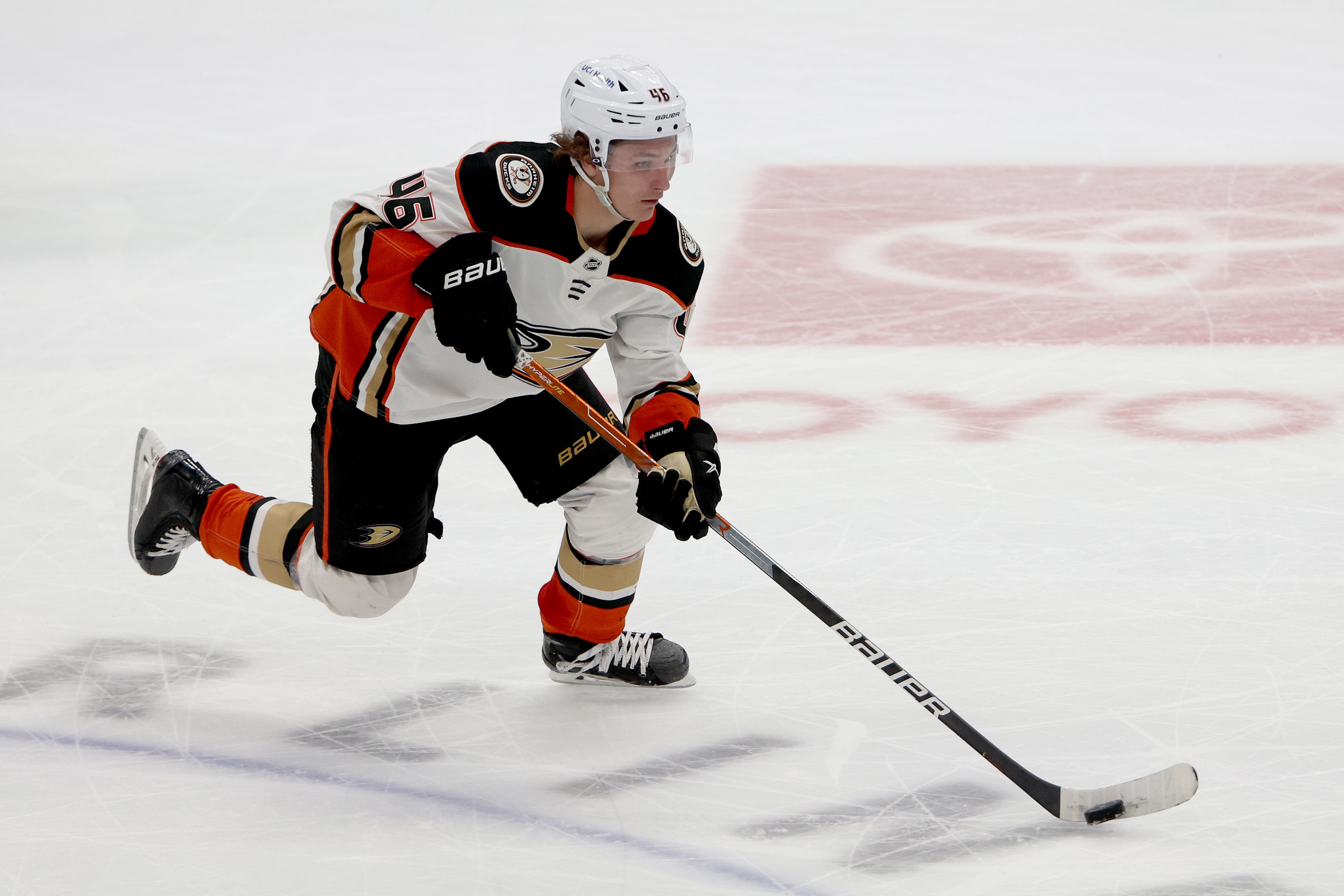 DALLAS, TEXAS - APRIL 29: Trevor Zegras #46 of the Anaheim Ducks controls the puck against the Dallas Stars in the third period at American Airlines Center on April 29, 2022 in Dallas, Texas. (Photo by Tom Pennington/Getty Images)