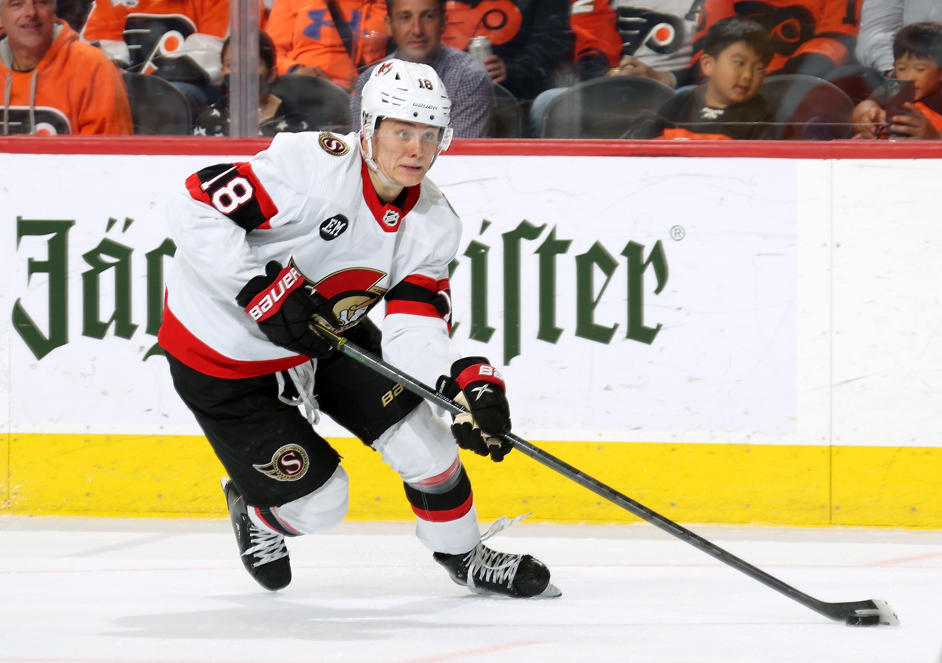 PHILADELPHIA, PA - APRIL 29:  Tim Stutzle #18 of the Ottawa Senators skates the puck against the Philadelphia Flyers at the Wells Fargo Center on April 29, 2022 in Philadelphia, Pennsylvania.  (Photo by Len Redkoles/NHLI via Getty Images)