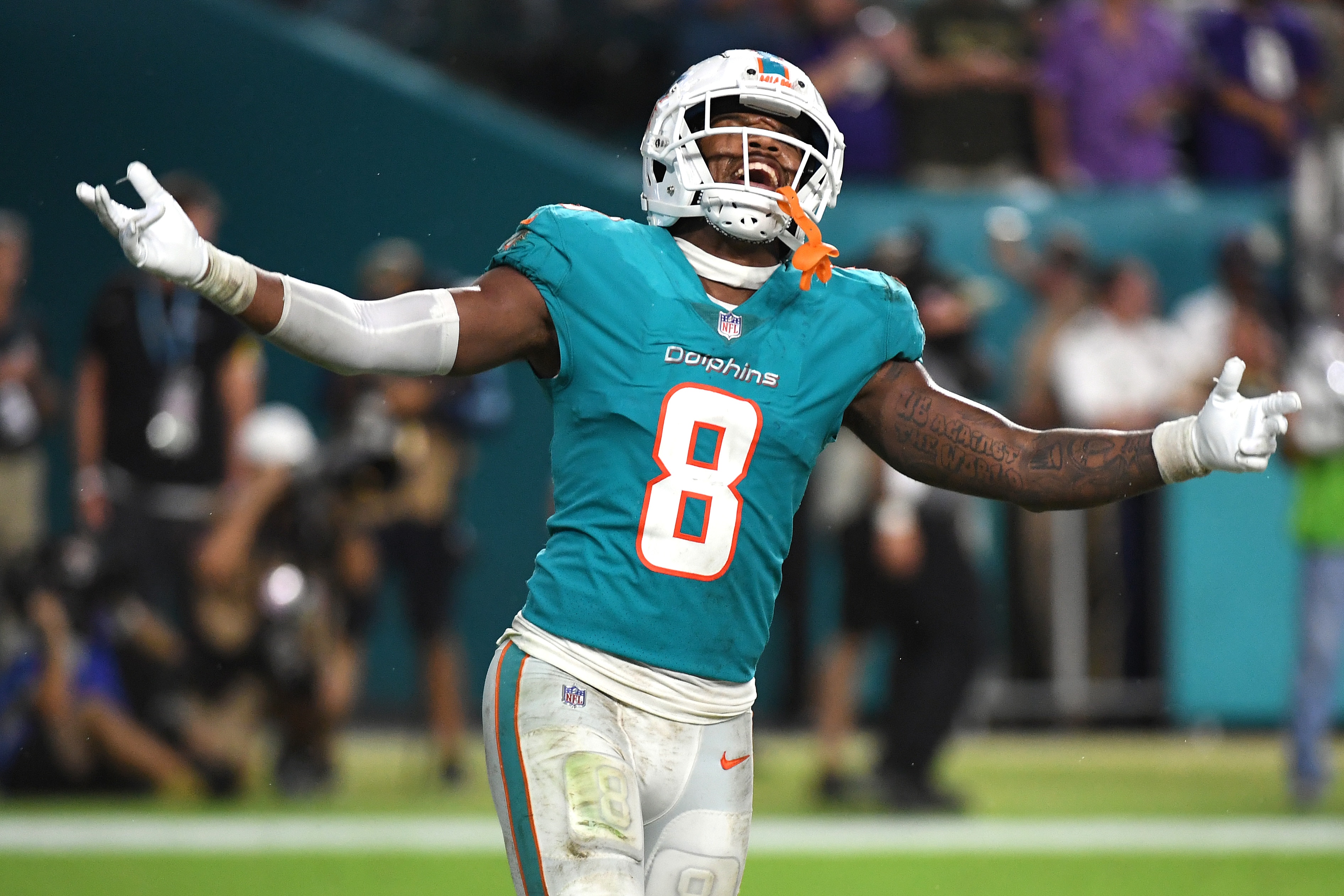 MIAMI GARDENS, FLORIDA - NOVEMBER 11: Jevon Holland #8 of the Miami Dolphins celebrates after a game ending interception against the Baltimore Ravens at Hard Rock Stadium on November 11, 2021 in Miami Gardens, Florida. (Photo by Eric Espada/Getty Images)