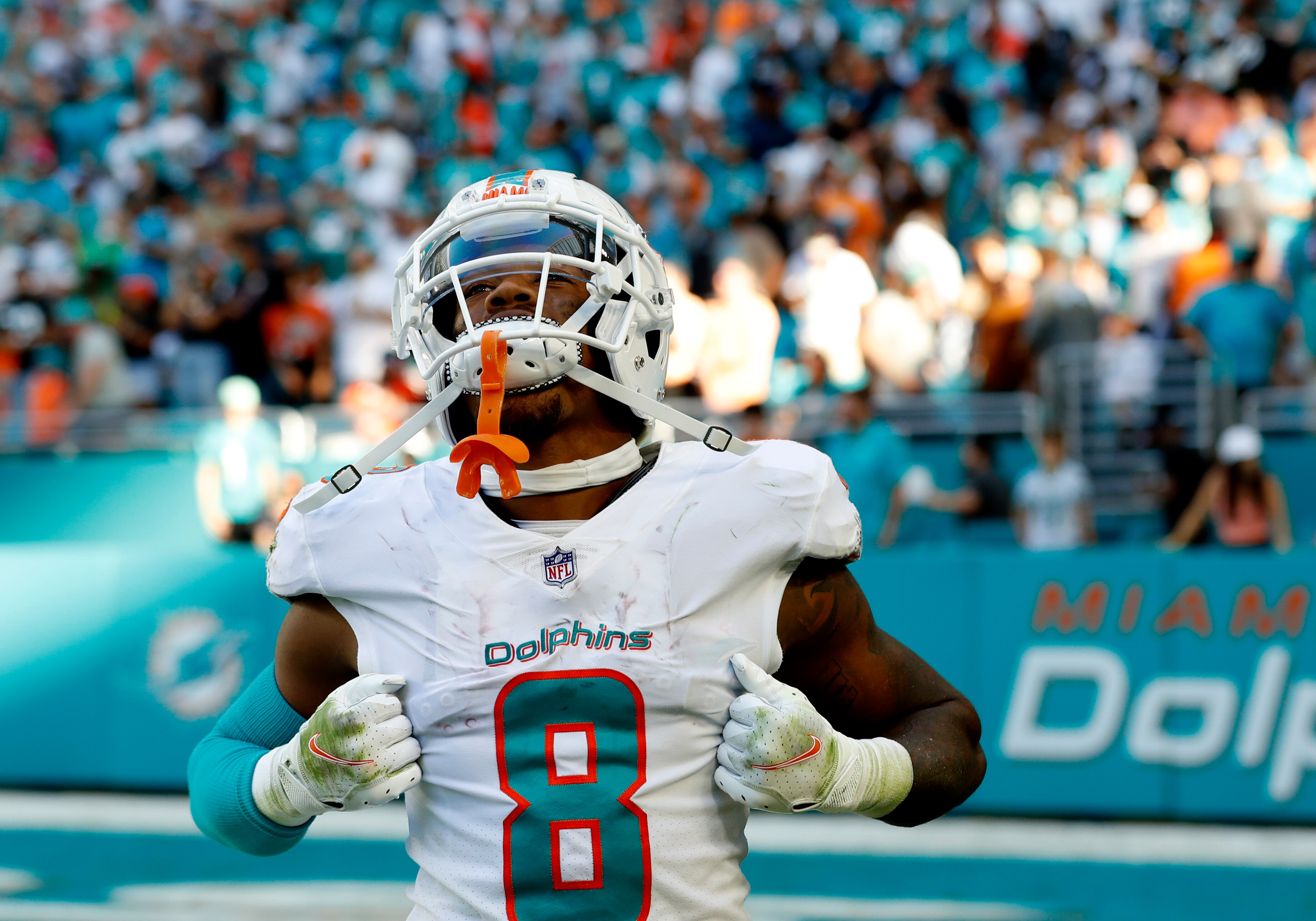 MIAMI GARDENS, FLORIDA - NOVEMBER 28: Jevon Holland #8 of the Miami Dolphins reacts during the fourth quarter against the Carolina Panthers at Hard Rock Stadium on November 28, 2021 in Miami Gardens, Florida. (Photo by Cliff Hawkins/Getty Images)