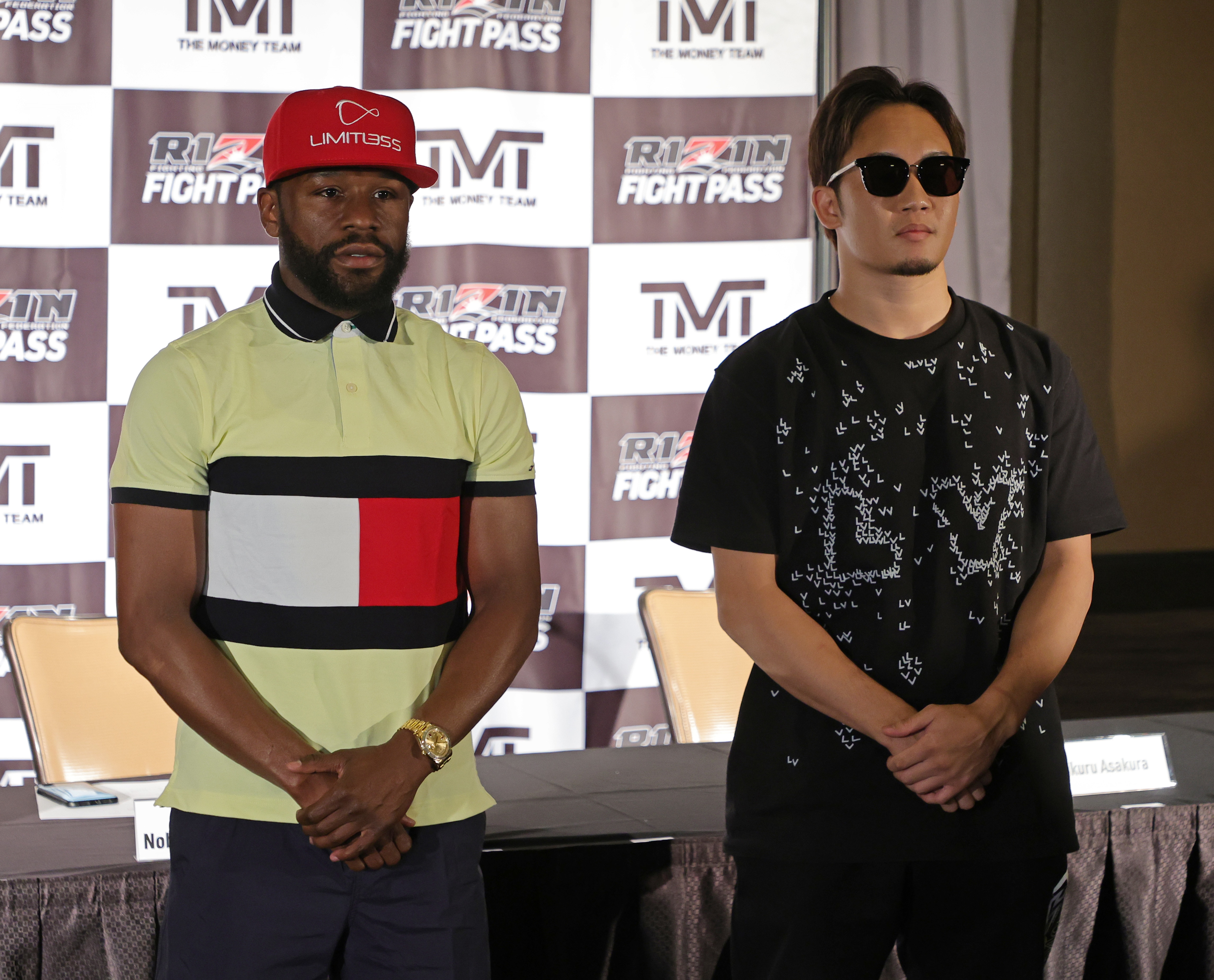 HENDERSON, NEVADA - JUNE 13: Boxer Floyd Mayweather Jr. (L) and mixed martial artist Mikuru Asakura pose during a news conference announcing their exhibition boxing bout at The M Resort on June 13, 2022 in Henderson, Nevada. The bout will take place in September 2022 in Japan as part of a RIZIN Fighting Federation show. (Photo by Ethan Miller/Getty Images)