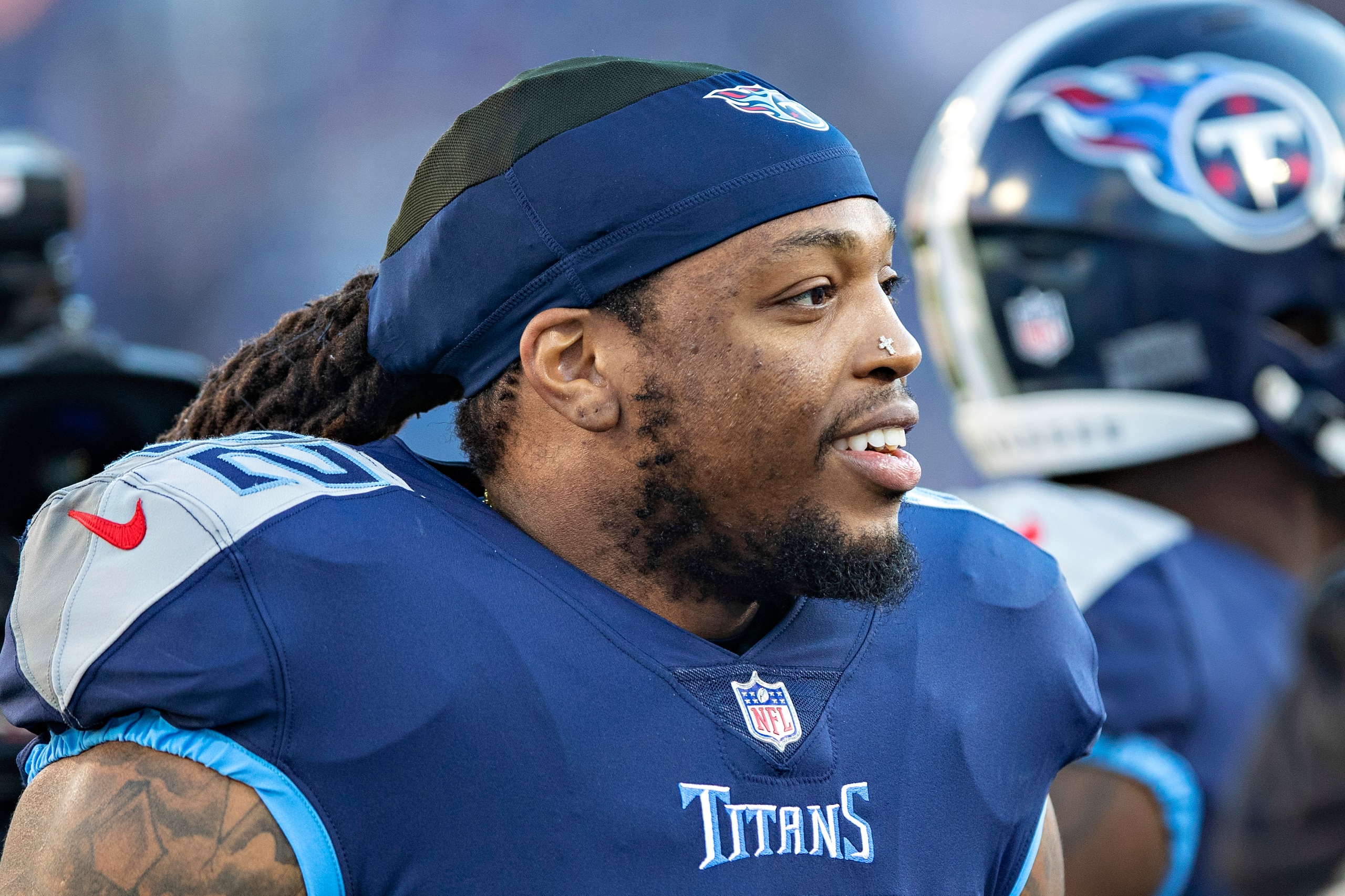 NASHVILLE, TENNESSEE - JANUARY 22: Derrick Henry #22 of the Tennessee Titans warms up before a game against the Cincinnati Bengals in the AFC Divisional Playoff game at Nissan Stadium on January 22, 2022 in Nashville, Tennessee. The Bengals defeated the Titans 19-16. (Photo by Wesley Hitt/Getty Images) NASHVILLE, TENNESSEE - JANUARY 22: Derrick Henry #22 of the Tennessee Titans warms up before a game against the Cincinnati Bengals in the AFC Divisional Playoff game at Nissan Stadium on January 22, 2022 in Nashville, Tennessee. The Bengals defeated the Titans 19-16. (Photo by Wesley Hitt/Getty Images)