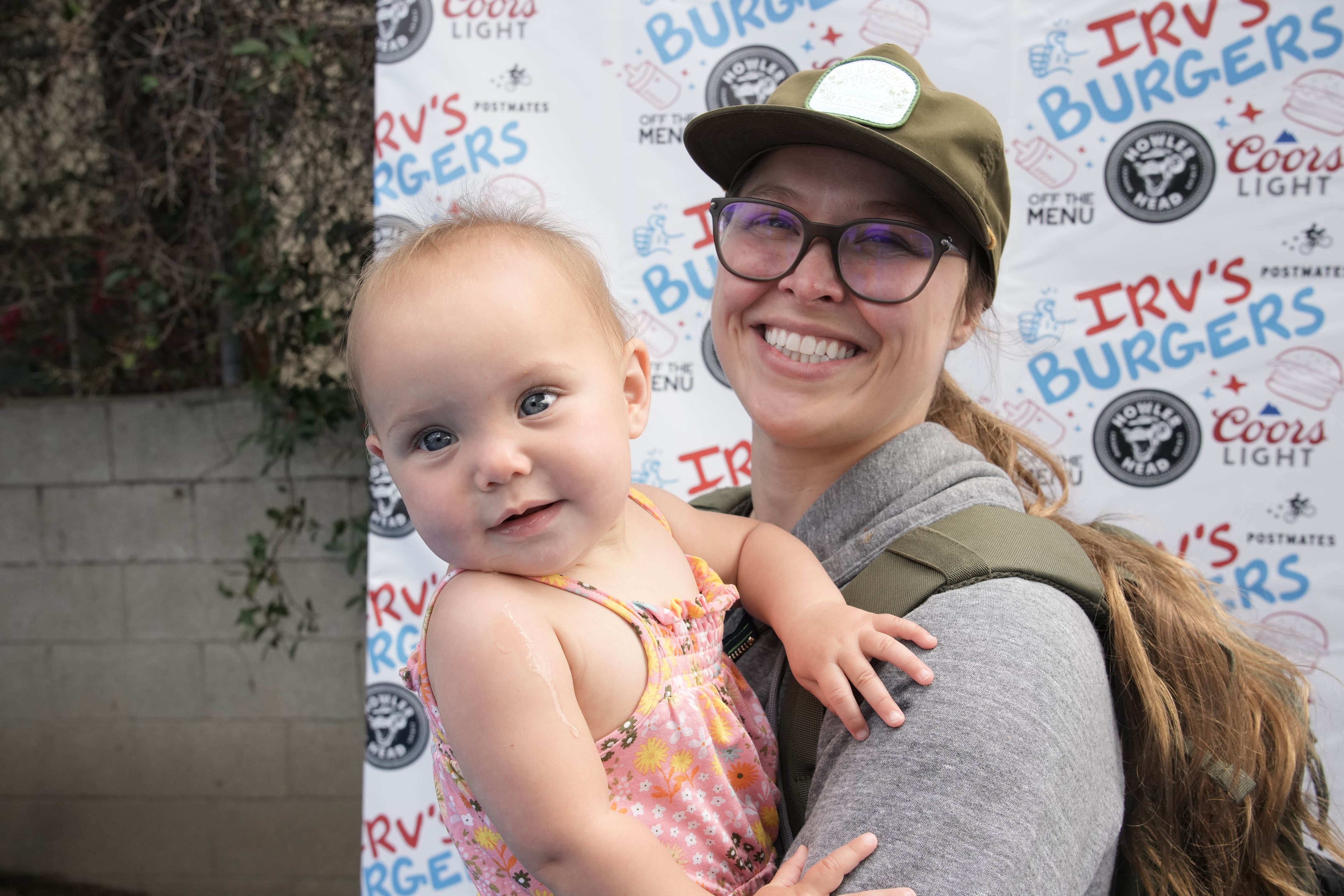 LOS ANGELES, CALIFORNIA - MAY 28: Ronda Rousey and La'akea Makalapuaokalanipo Browne celebrate National Burger Day at the friends and family preview party for the new Irv's Burgers on May 28, 2022 in Los Angeles, California. (Photo by Jeff Kravitz/FilmMagic)