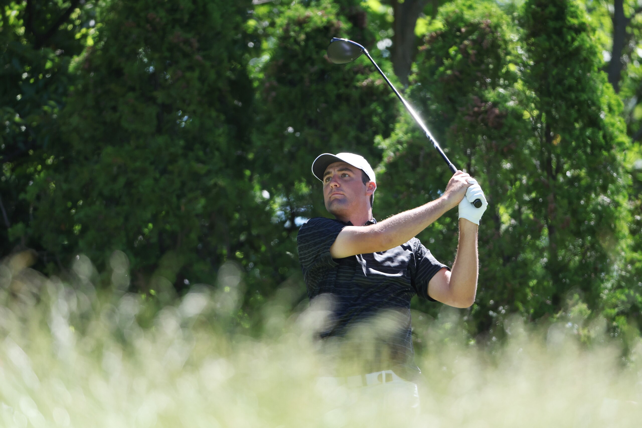 BROOKLINE, MASSACHUSETTS - JUNE 14: Scottie Scheffler of the United States plays a tee shot on the seventh hole during a practice round prior to the US Open at The Country Club on June 14, 2022 in Brookline, Massachusetts. (Photo by Patrick Smith/Getty Images)