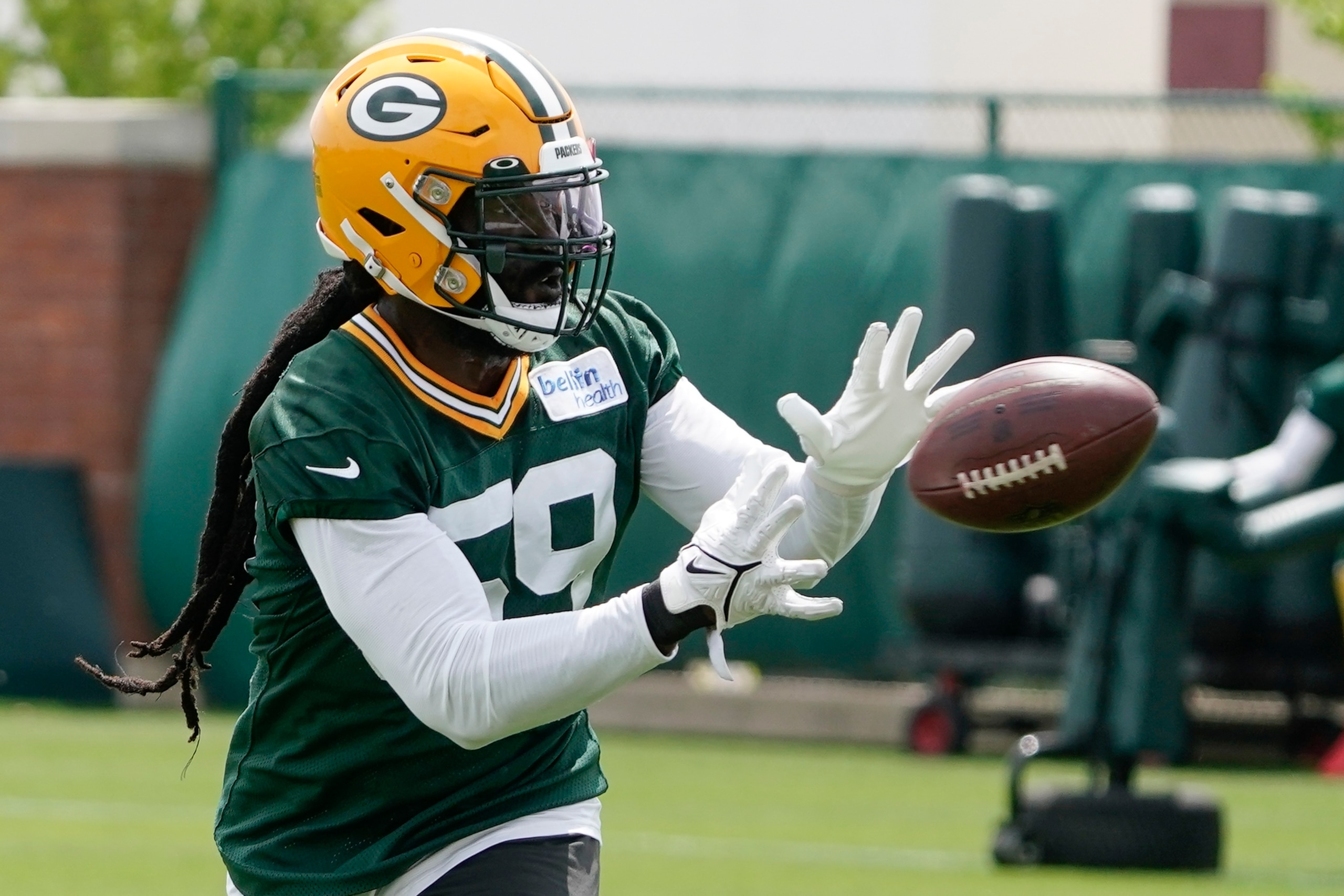 Green Bay Packers' De'Vondre Campbell runs a drill at the NFL football team's practice field training camp Tuesday, May 31, 2022, in Green Bay, Wis. (AP Photo/Morry Gash)