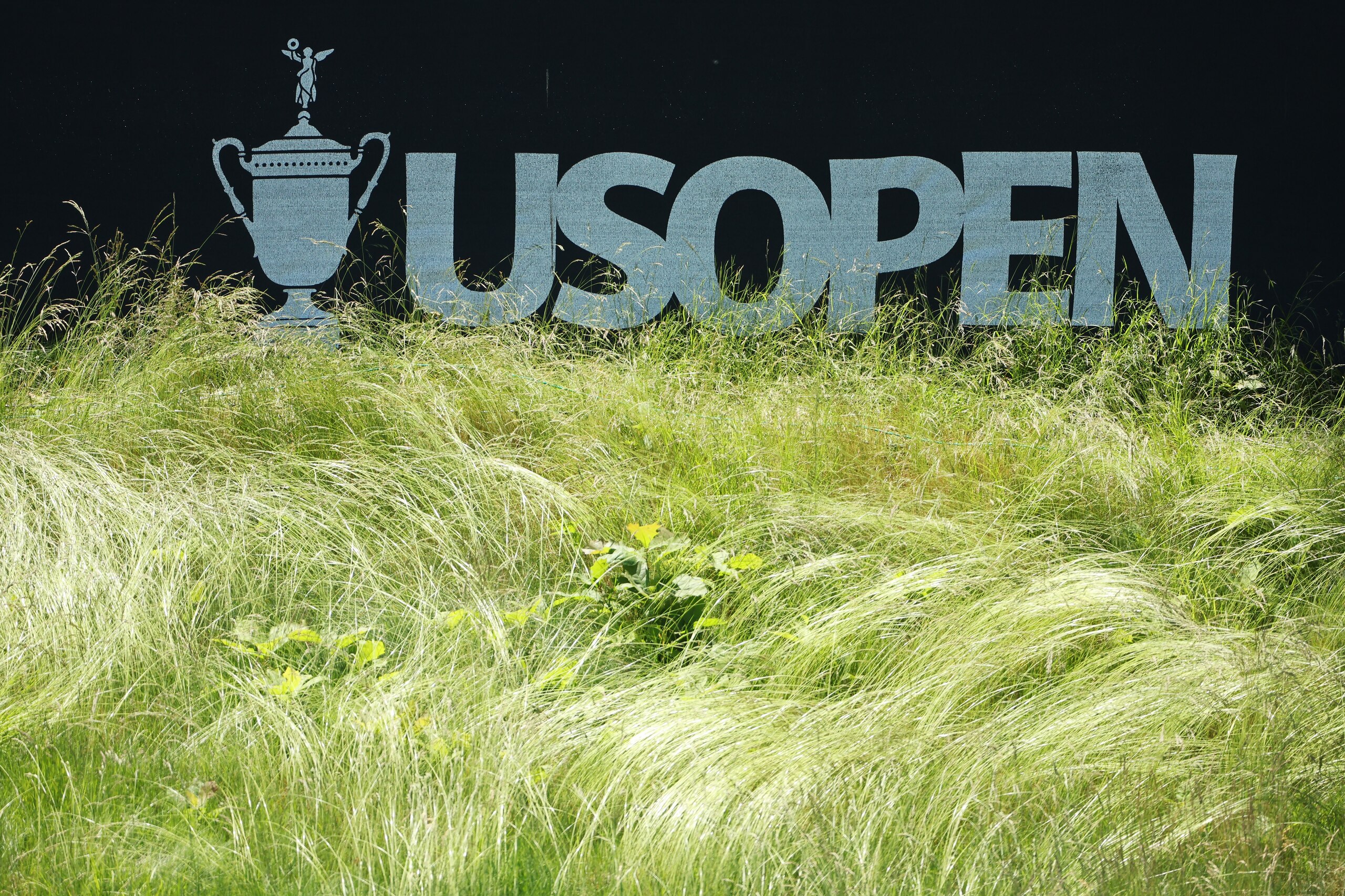 BROOKLINE, MASSACHUSETTS - JUNE 14: U.S. Open signage is seen during a practice round prior to the US Open at The Country Club on June 14, 2022 in Brookline, Massachusetts. (Photo by Patrick Smith/Getty Images)