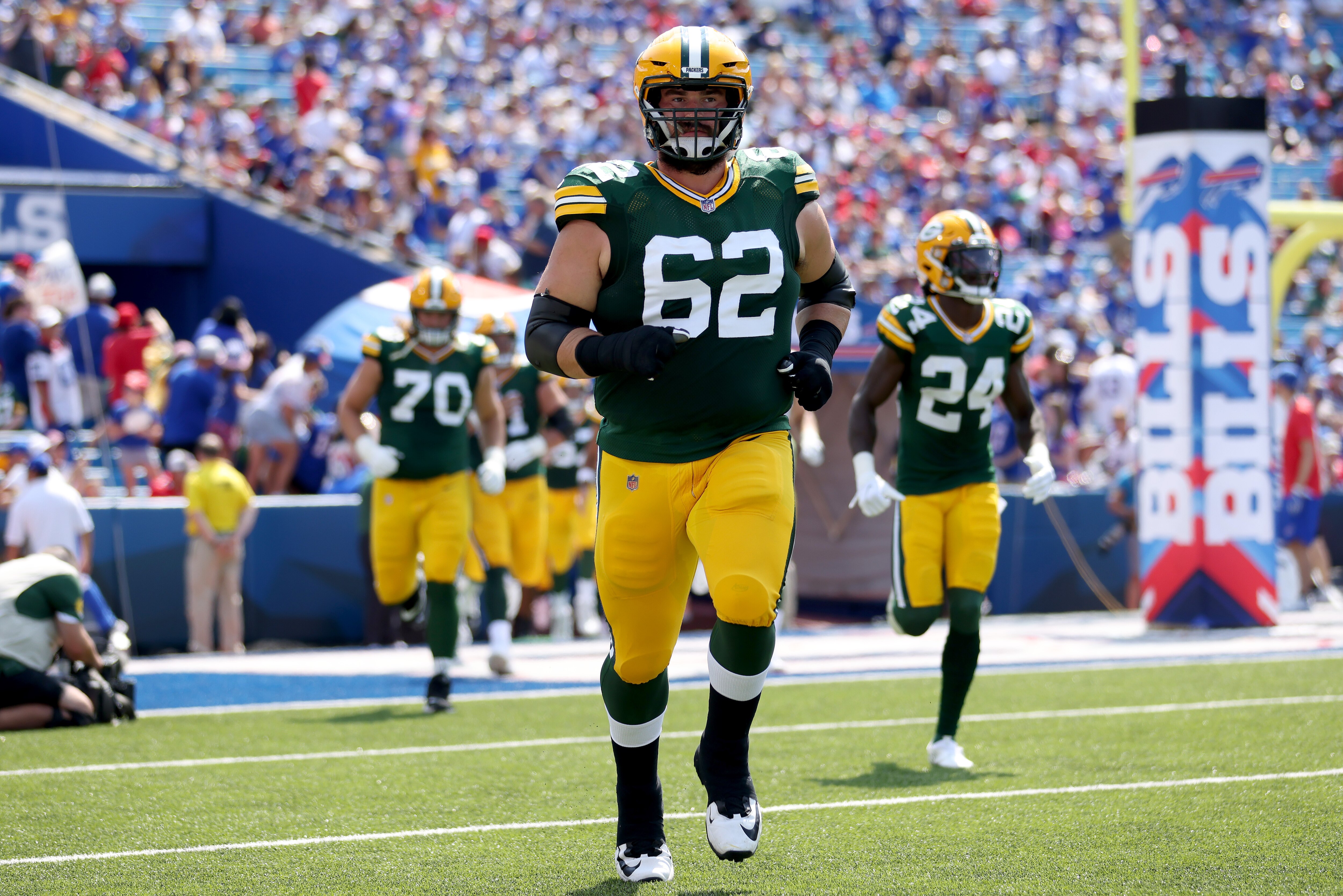 ORCHARD PARK, NEW YORK - AUGUST 28: Lucas Patrick #62 of the Green Bay Packers runs on the field prior to a game against the Buffalo Bills at Highmark Stadium on August 28, 2021 in Orchard Park, New York. (Photo by Bryan Bennett/Getty Images)